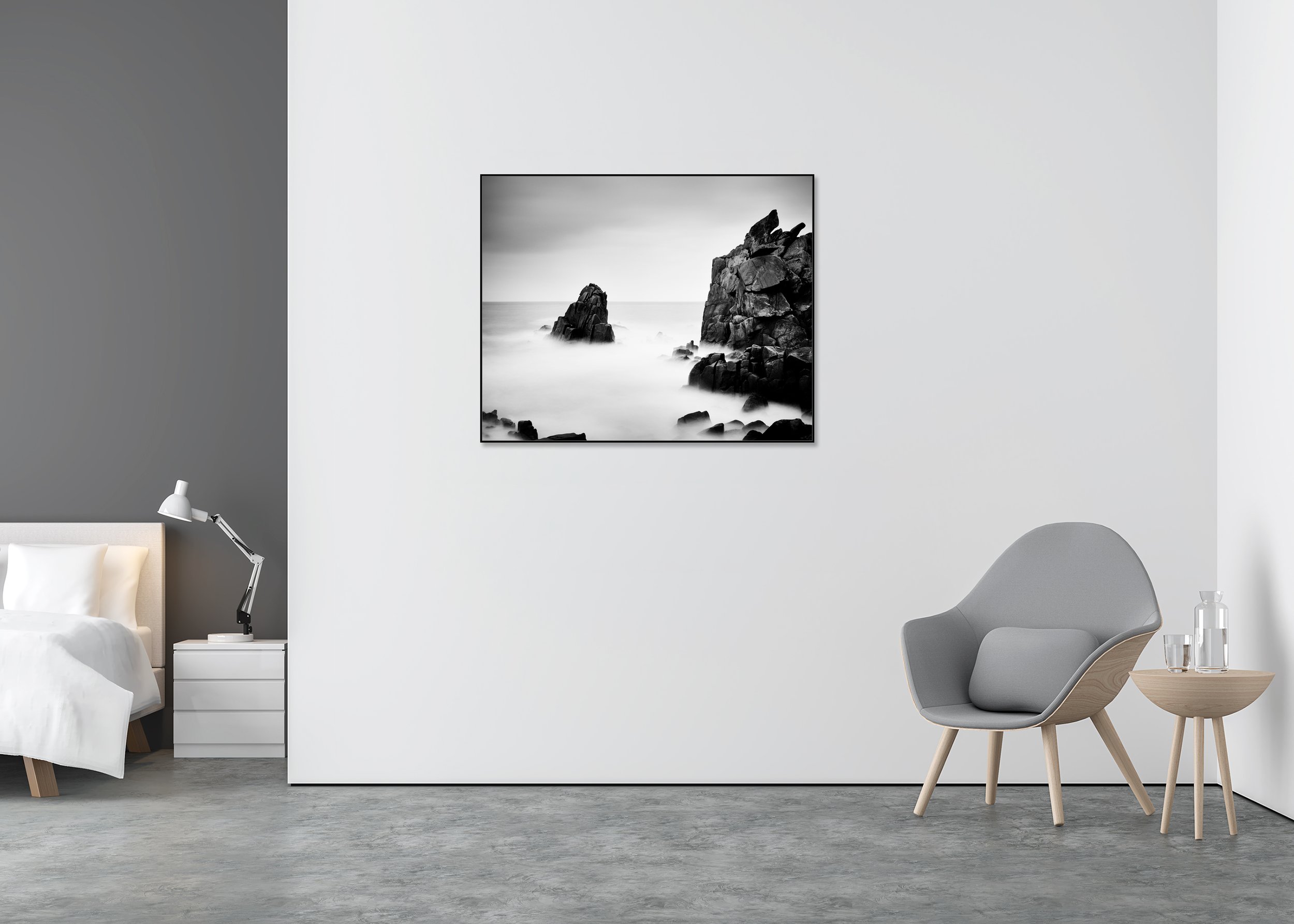 Rocky Stone Coast displayed in a minimalist bedroom, mounted on aluminium Dibond in a black ArtBox frame by Gerald Berghammer.