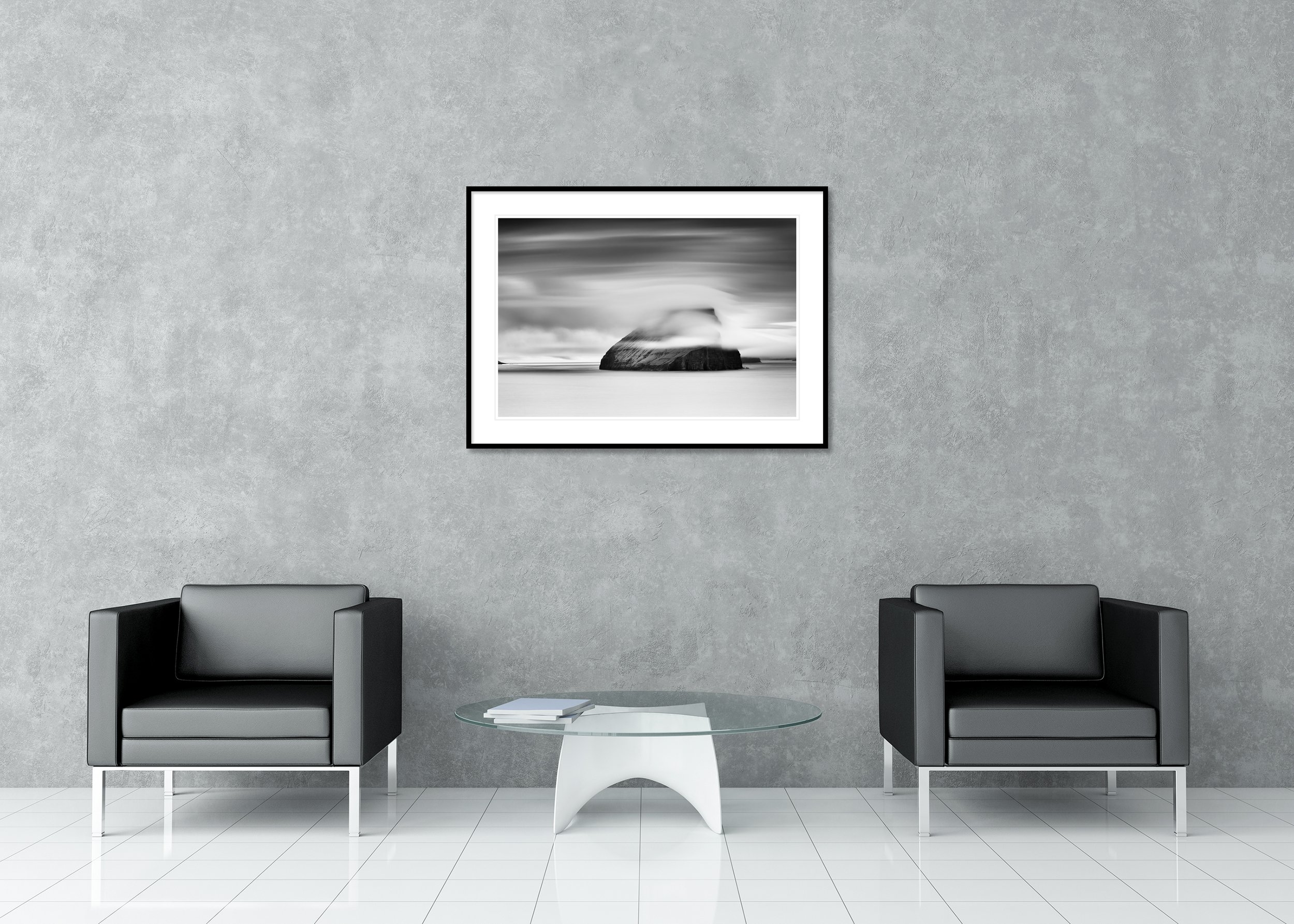 Black and white long-exposure image of a sea stack in the Faroe Islands, archival pigment print in a classic frame with mount