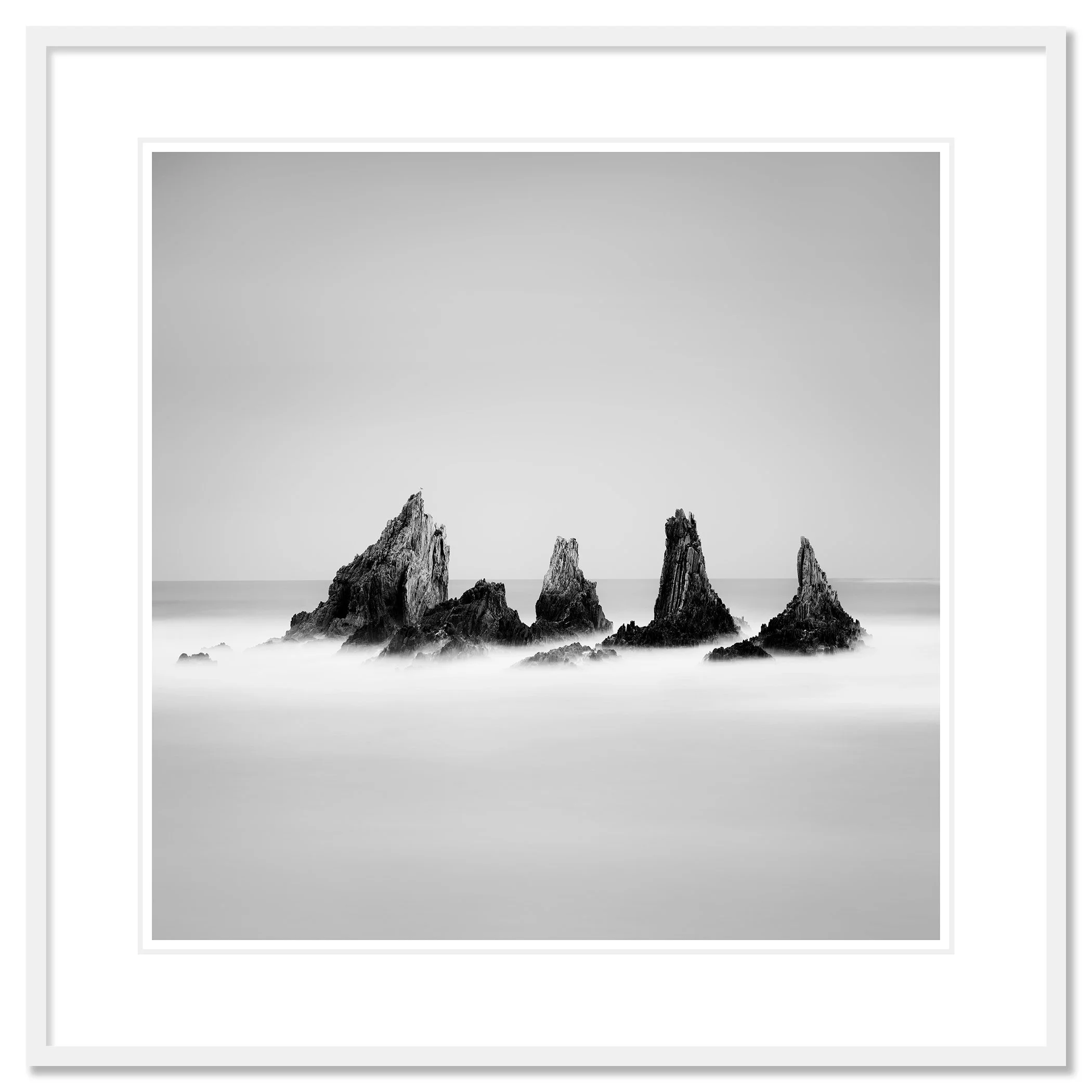 Rocky Peaks Study 1 by Gerald Berghammer, black-and-white fine art photograph of Spanish sea stacks in a white aluminium frame with white mount.