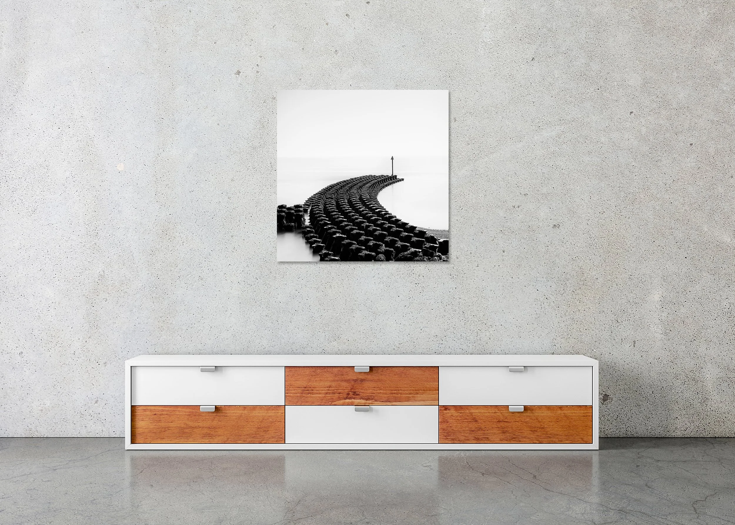 Black and white long exposure coastline print with curved groynes, mounted to Dibond, frameless