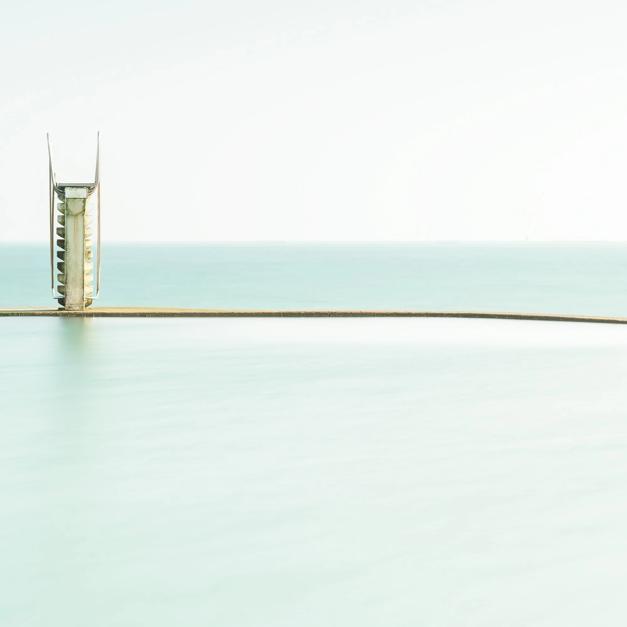 Detail of Diving Platform Panorama Study 2 by Gerald Berghammer, with the diving platform beside calm turquoise water and open sea.