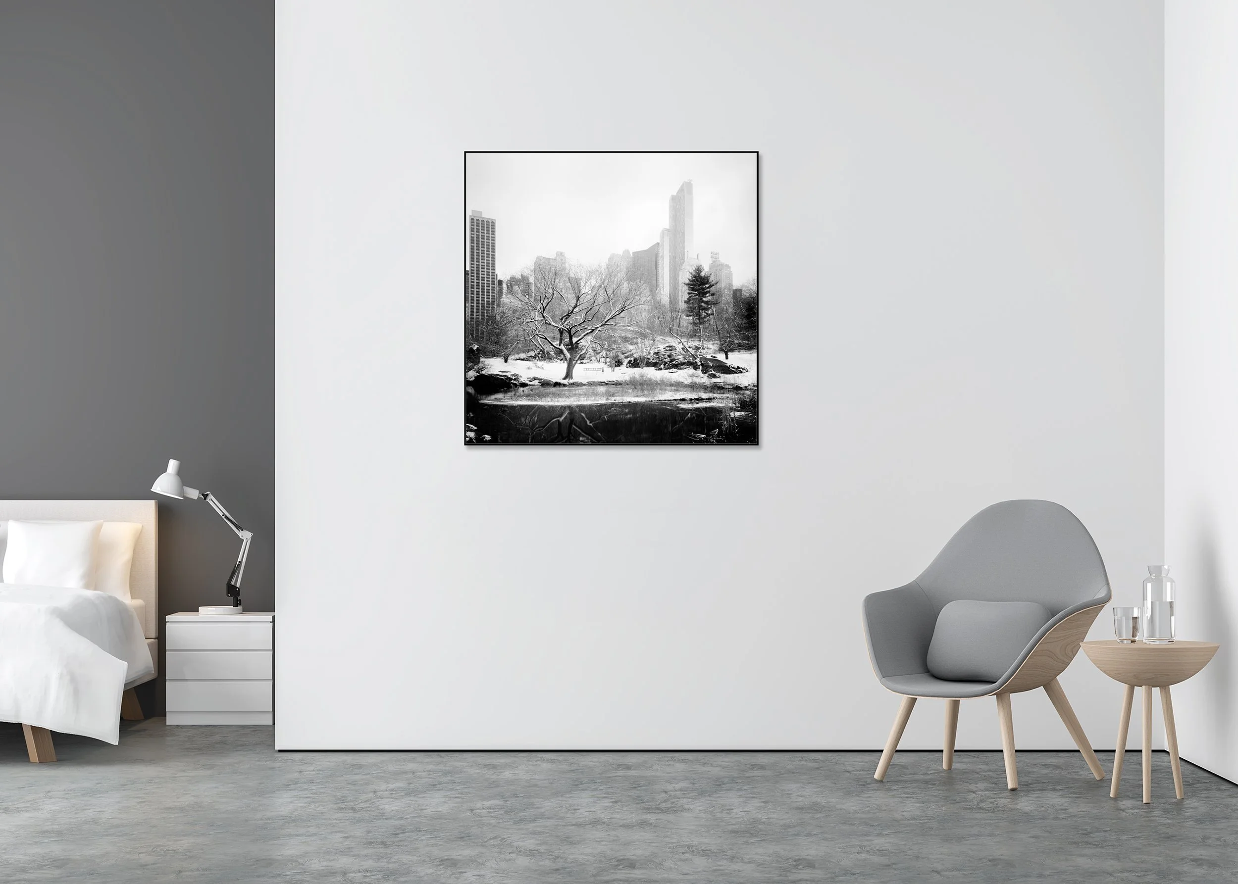 Snow-Covered Central Park Study 7 displayed in a modern interior as a black-and-white Dibond print in a black aluminium ArtBox frame by Gerald Berghammer.