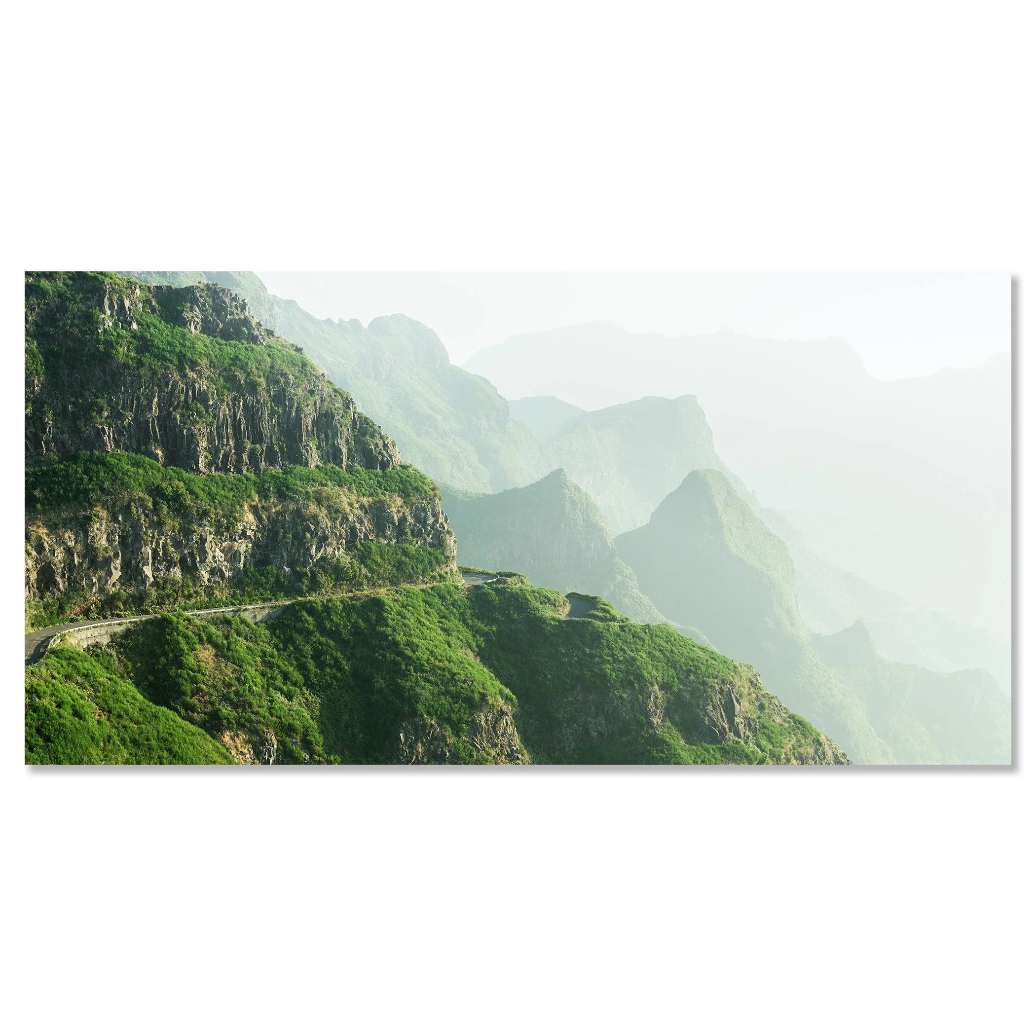 © 2021 Gerald Berghammer - Color Fine Art Landscape Photography. A winding mountain road through lush green cliffs and misty mountains in the background. Chromaluxe frameless
