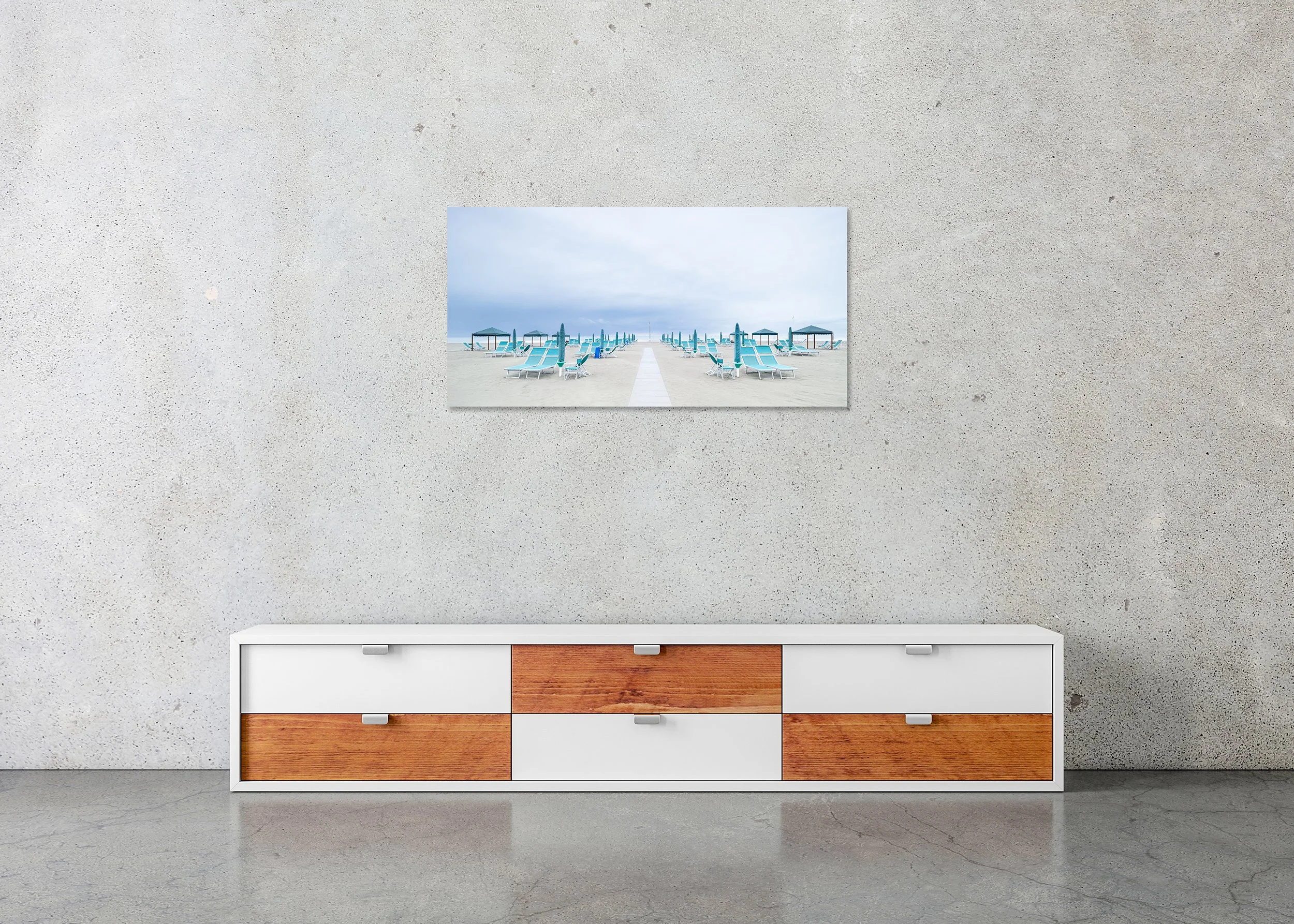 Sun Loungers on the Beach, Study 4 – frameless colour photograph on aluminium Dibond displayed above a low cabinet.
