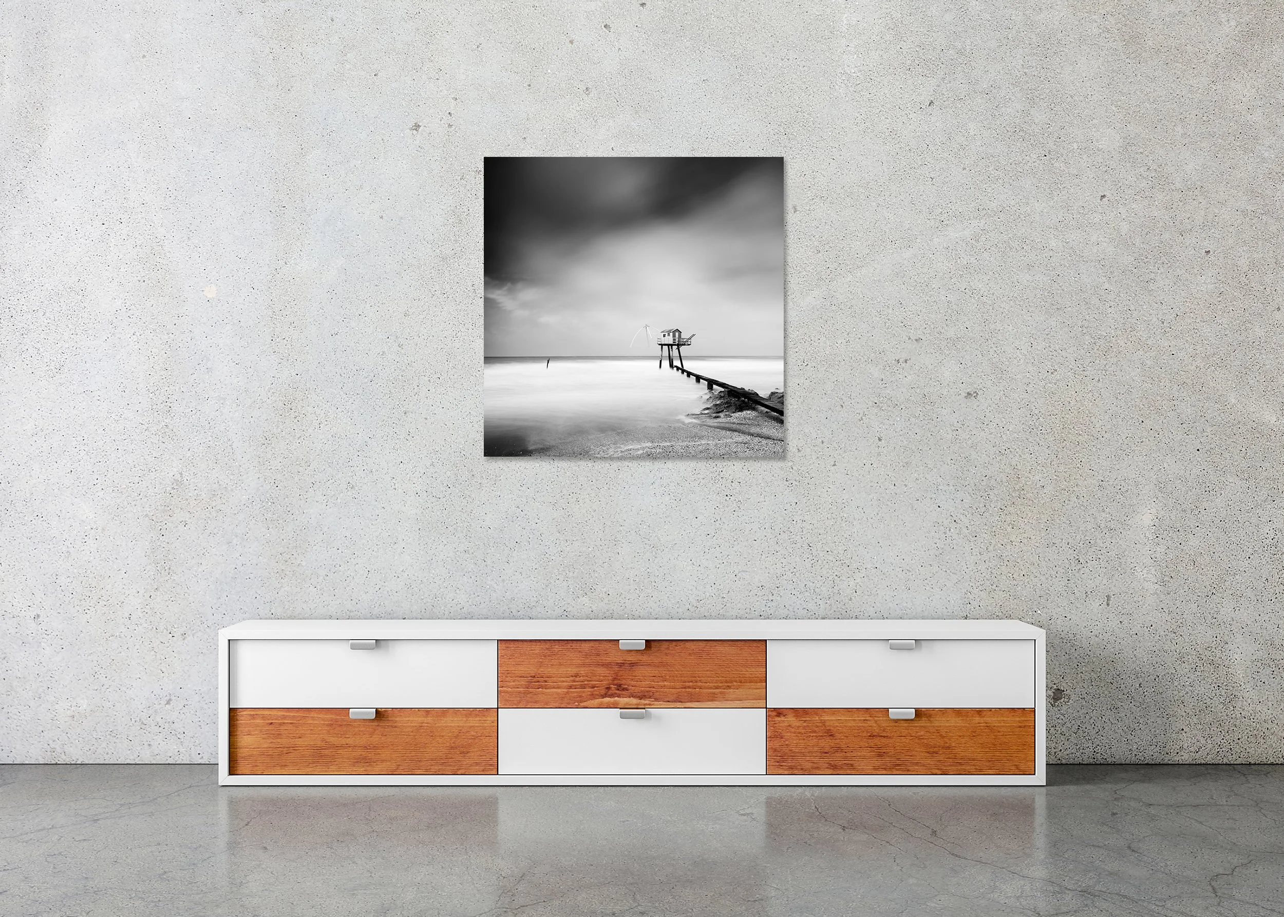Fishing Hut on Stilts Study 8 displayed in a modern interior as a frameless black-and-white artwork mounted on aluminium Dibond. Photo by Gerald Berghammer.