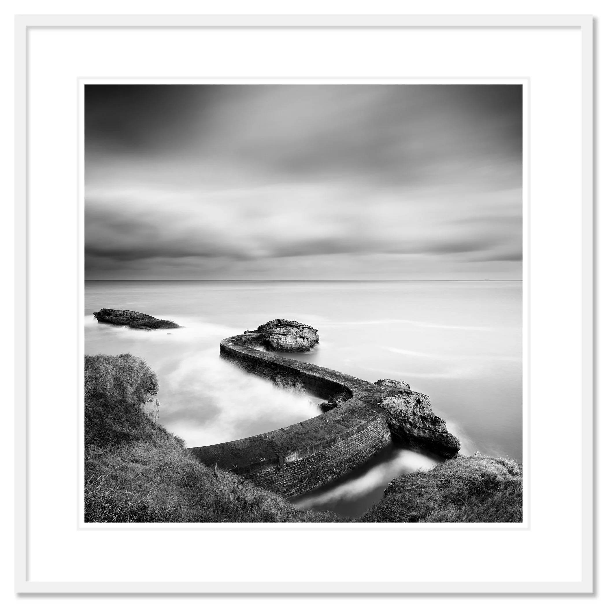 Breakwater Pier Study 1 by Gerald Berghammer, black-and-white fine art print in a white aluminium frame with white mount.