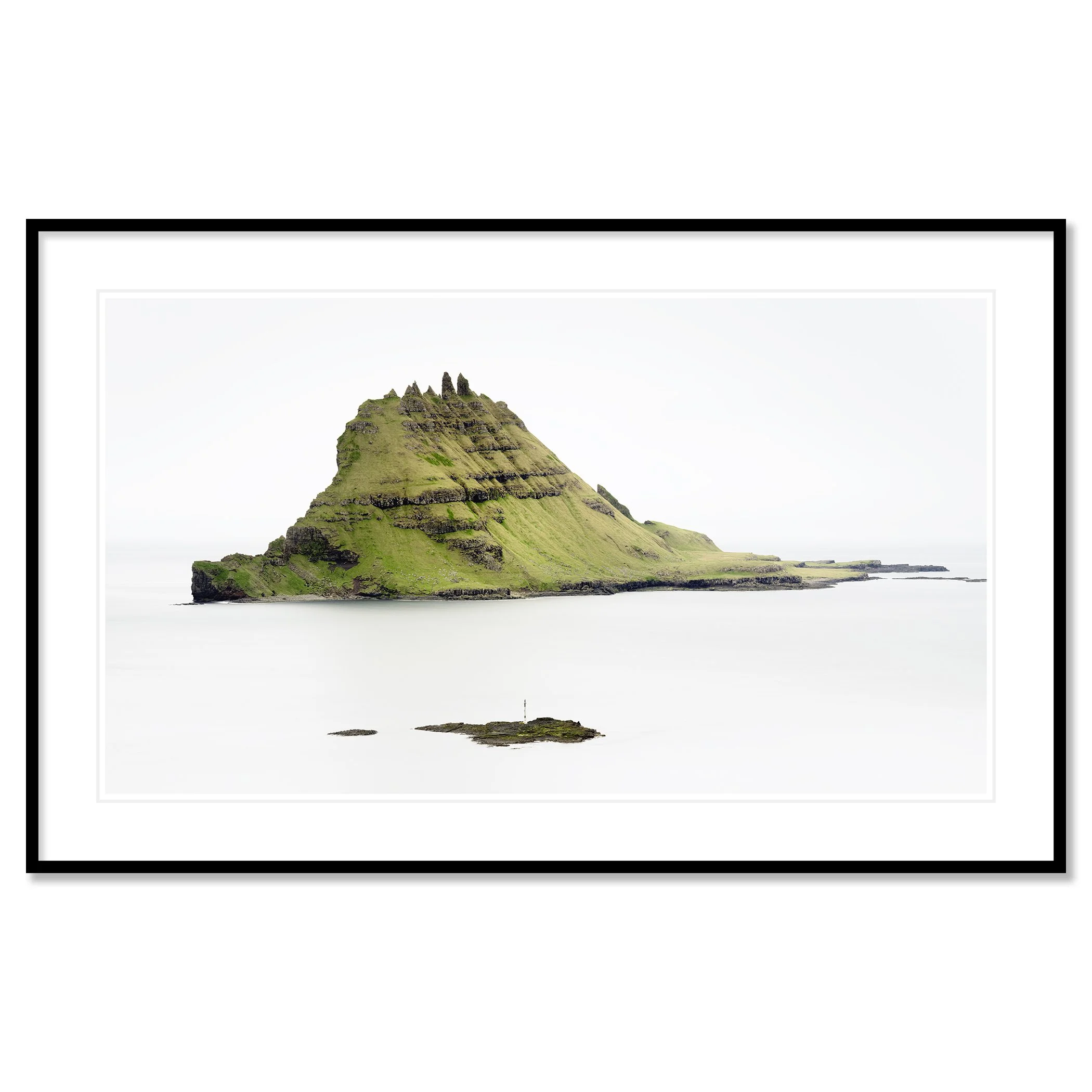Green Rock Island – Faroe Islands, colour fine art print in a black aluminium frame with white mount