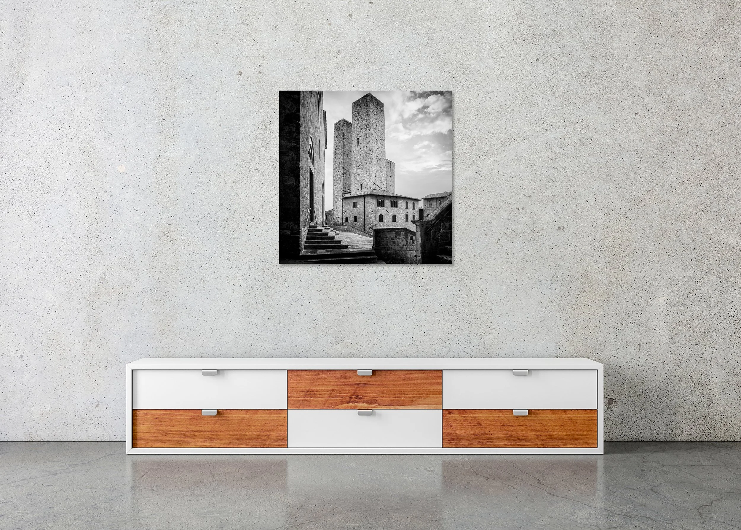 Monochrome photo print of medieval towers above historic buildings in San Gimignano, Italy, mounted to Dibond with a frameless finish.