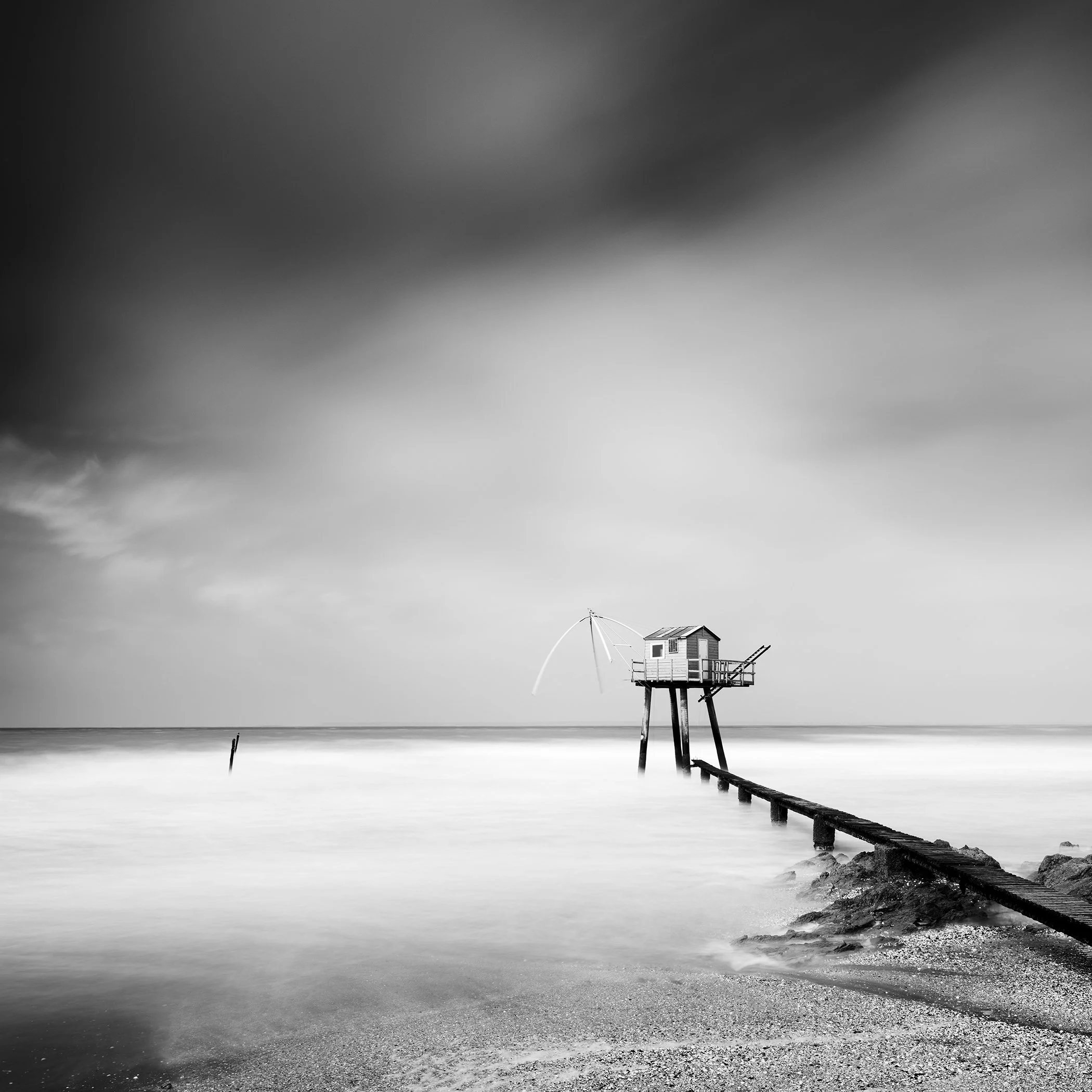 Fishing Hut on Stilts Study 8 by Gerald Berghammer, minimalist black-and-white long-exposure seascape on the French coast.