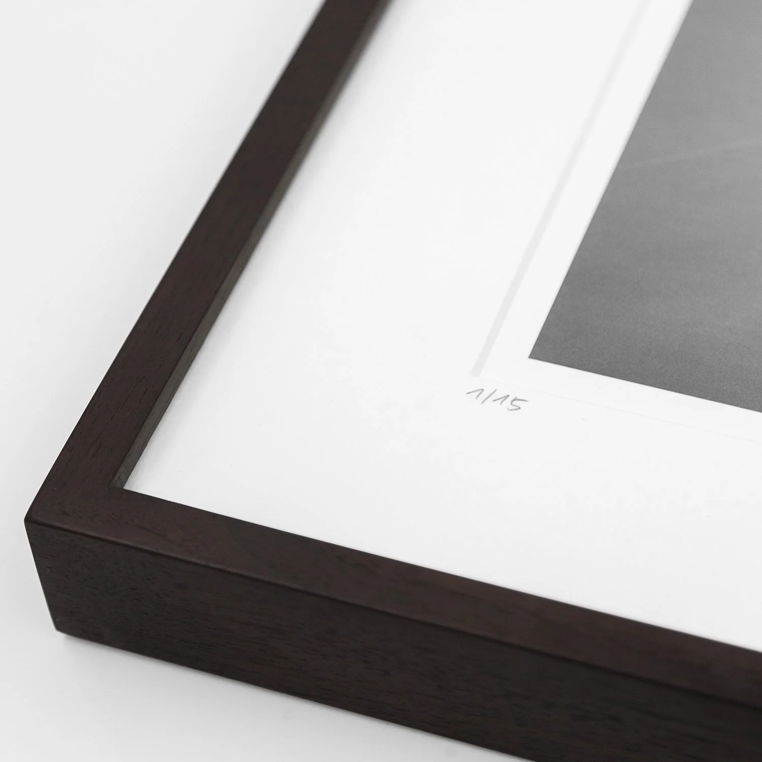 Detail of Canal Grande Study 1 by Gerald Berghammer, showing the handwritten edition number 1/15 beside the dark wooden frame.