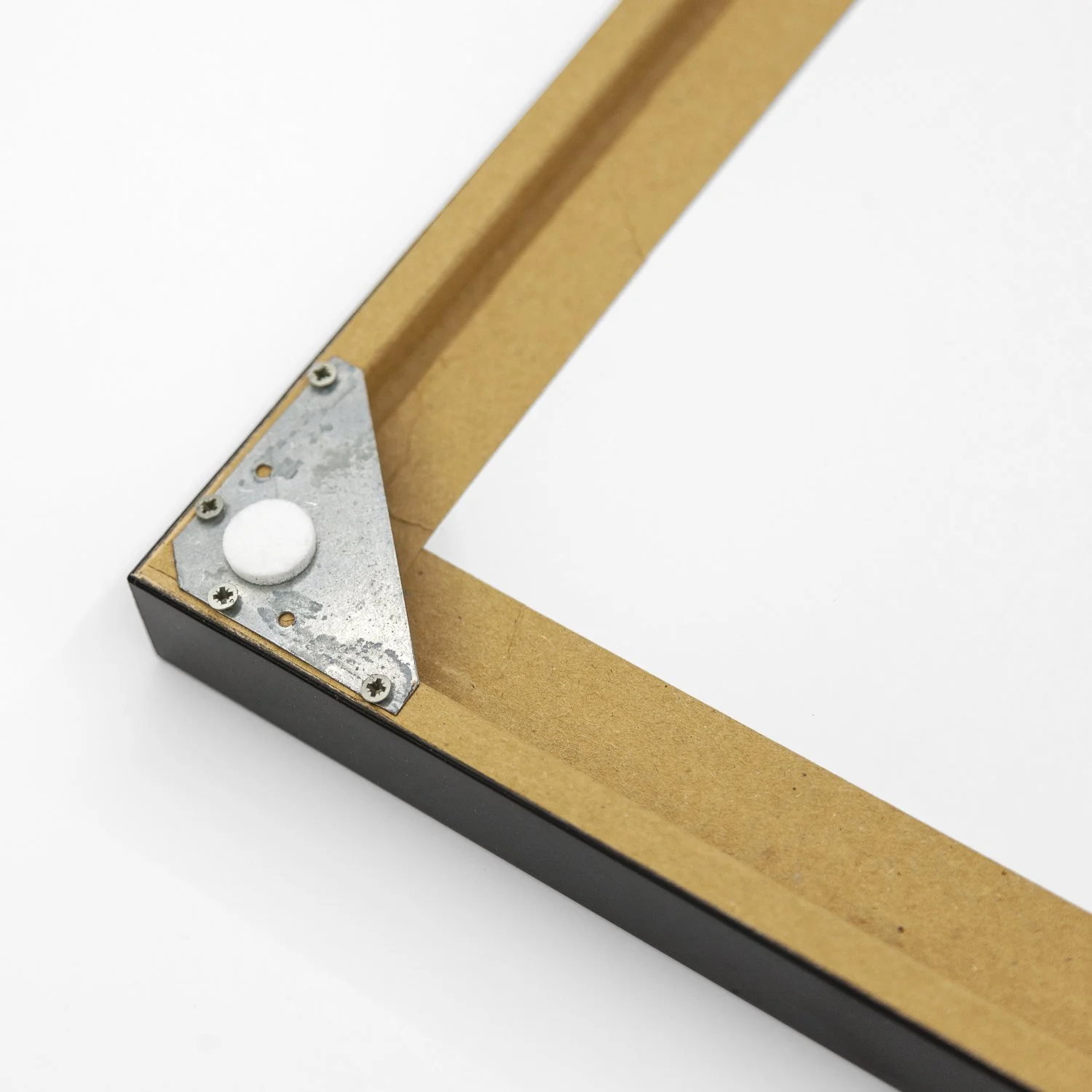 Detail of the metal corner reinforcement on the reverse of the black wooden frame of Mirador Es Colomer Study 1 by Gerald Berghammer.