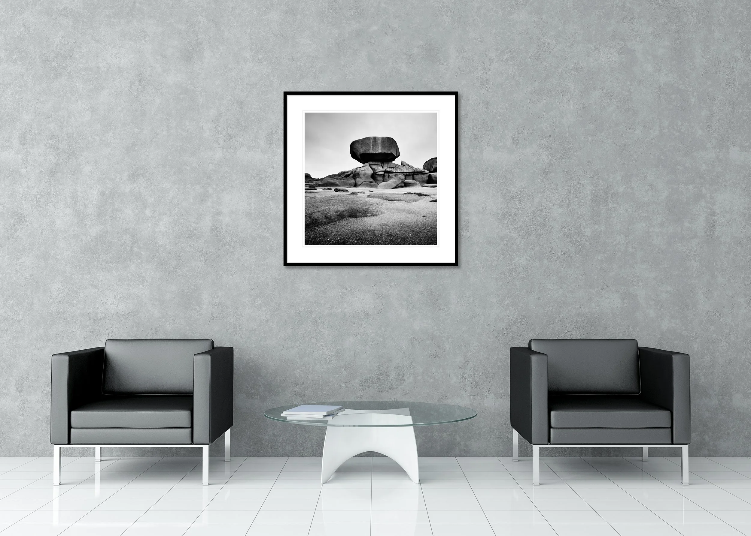 Pink Granite Coast Study 1 displayed in a modern interior as an archival pigment print in a black aluminium frame with white mount by Gerald Berghammer.