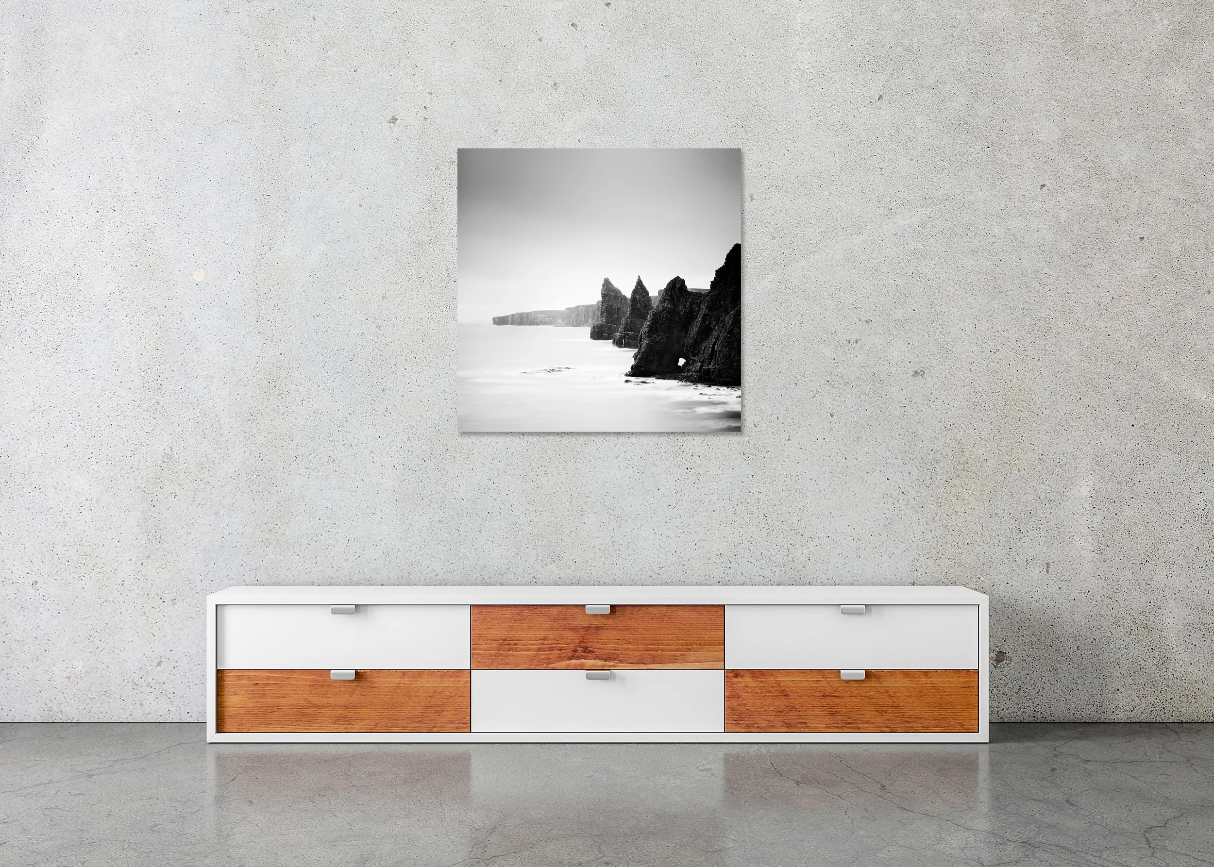 Duncansby Stacks Study 2 displayed frameless on a wall, mounted on aluminium Dibond; black-and-white seascape by Gerald Berghammer.