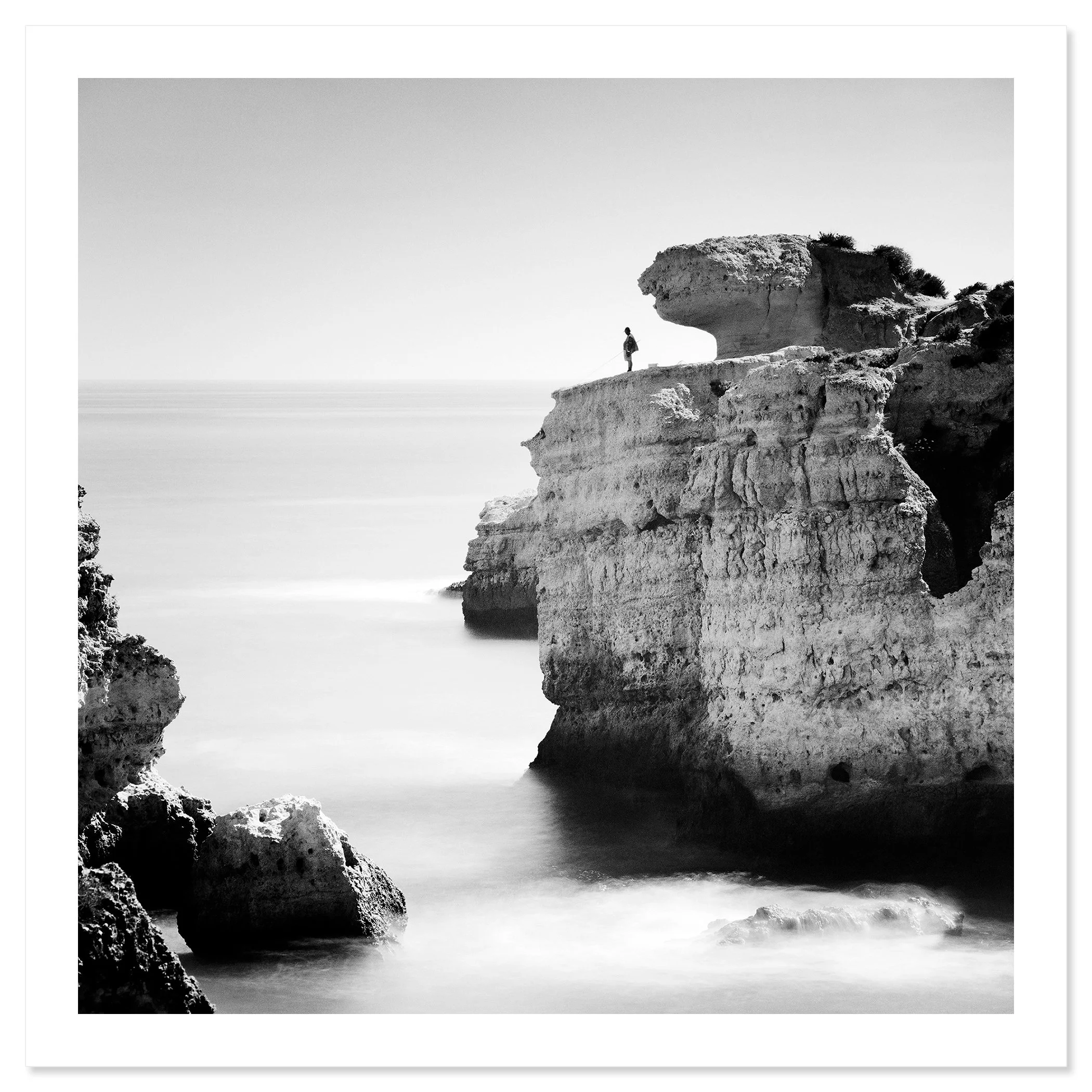 Rock Fishing Study 1 – black-and-white archival pigment print on baryta paper with a white border. Photo by Gerald Berghammer.