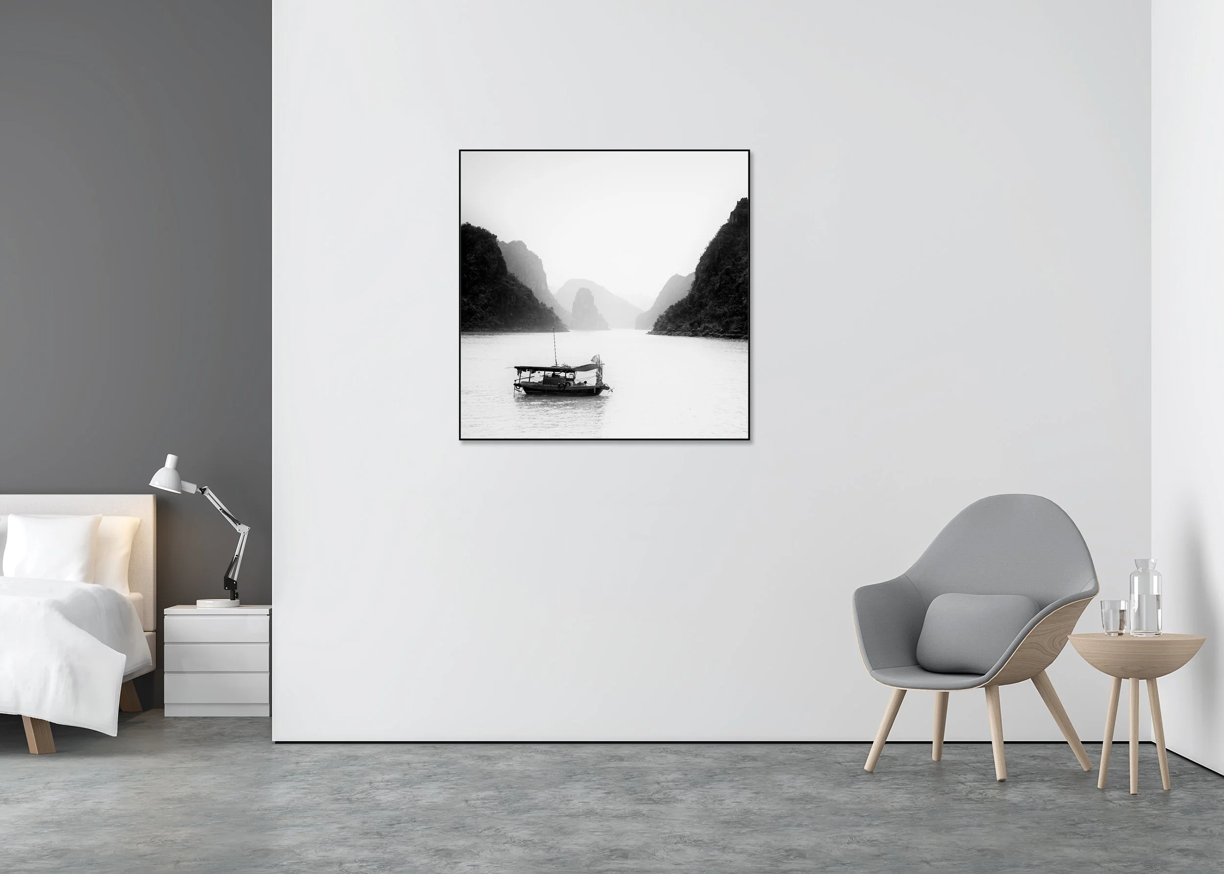 Black-and-white photo print of a small boat on calm water among misty limestone karsts in Ha Long Bay, Vietnam, mounted to Dibond in an aluminium ArtBox.