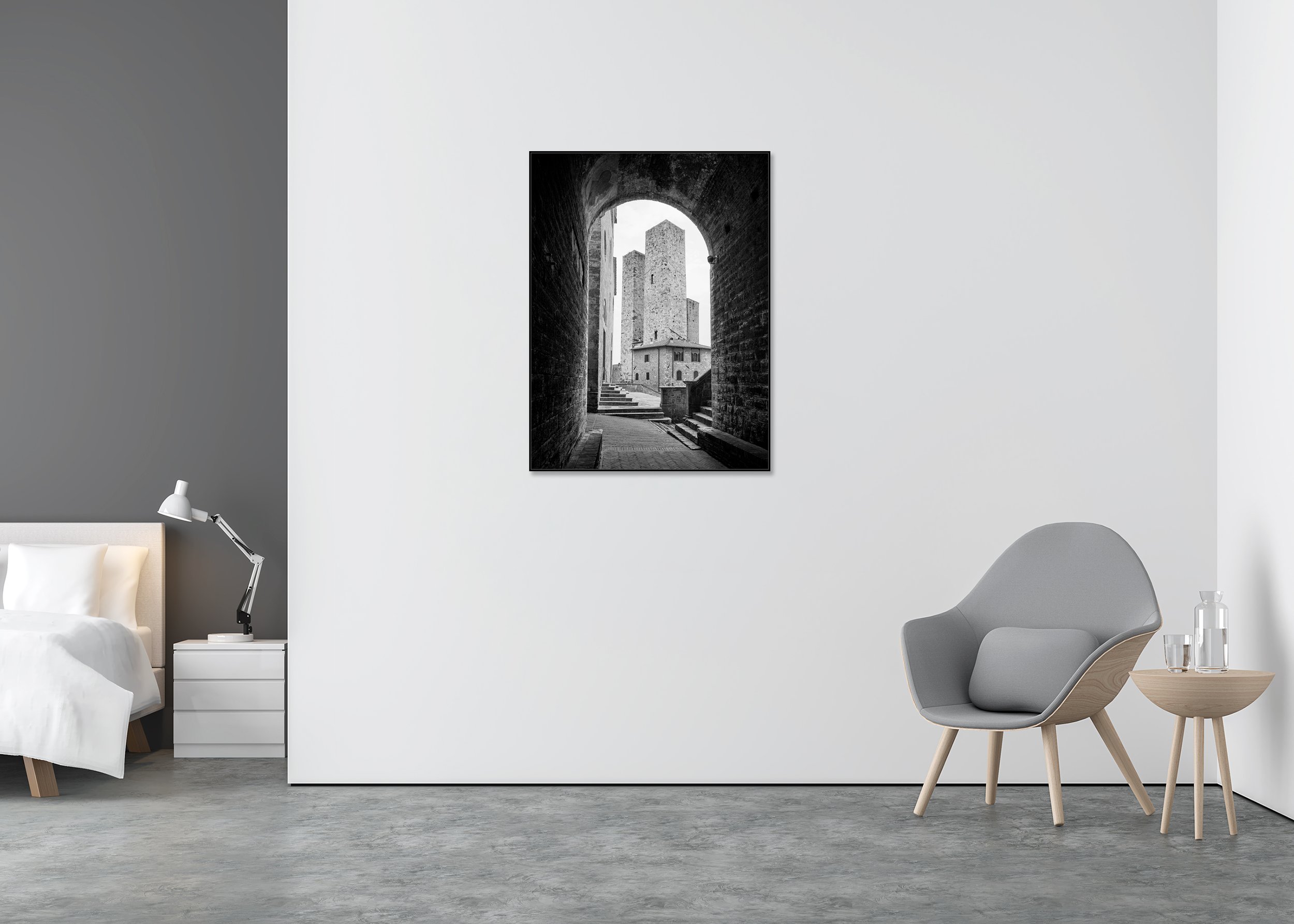 Black-and-white image of medieval stone towers in San Gimignano, seen through a historic archway in Tuscany, Italy. ChromaLuxe metal print, aluminium ArtBox.