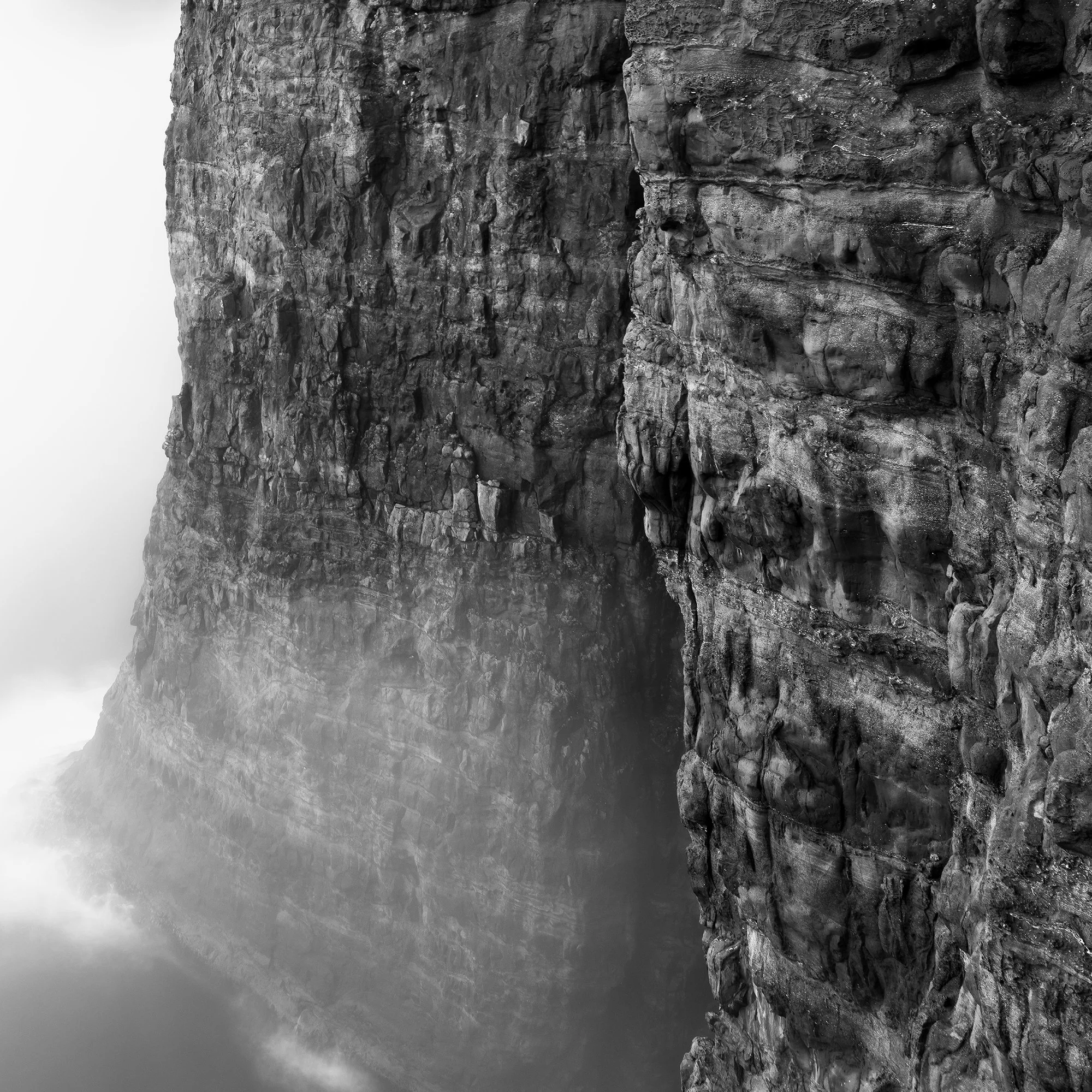 Foggy Slave Cliff Study 3 by Gerald Berghammer, detail of a rugged basalt cliff face disappearing into ocean mist.