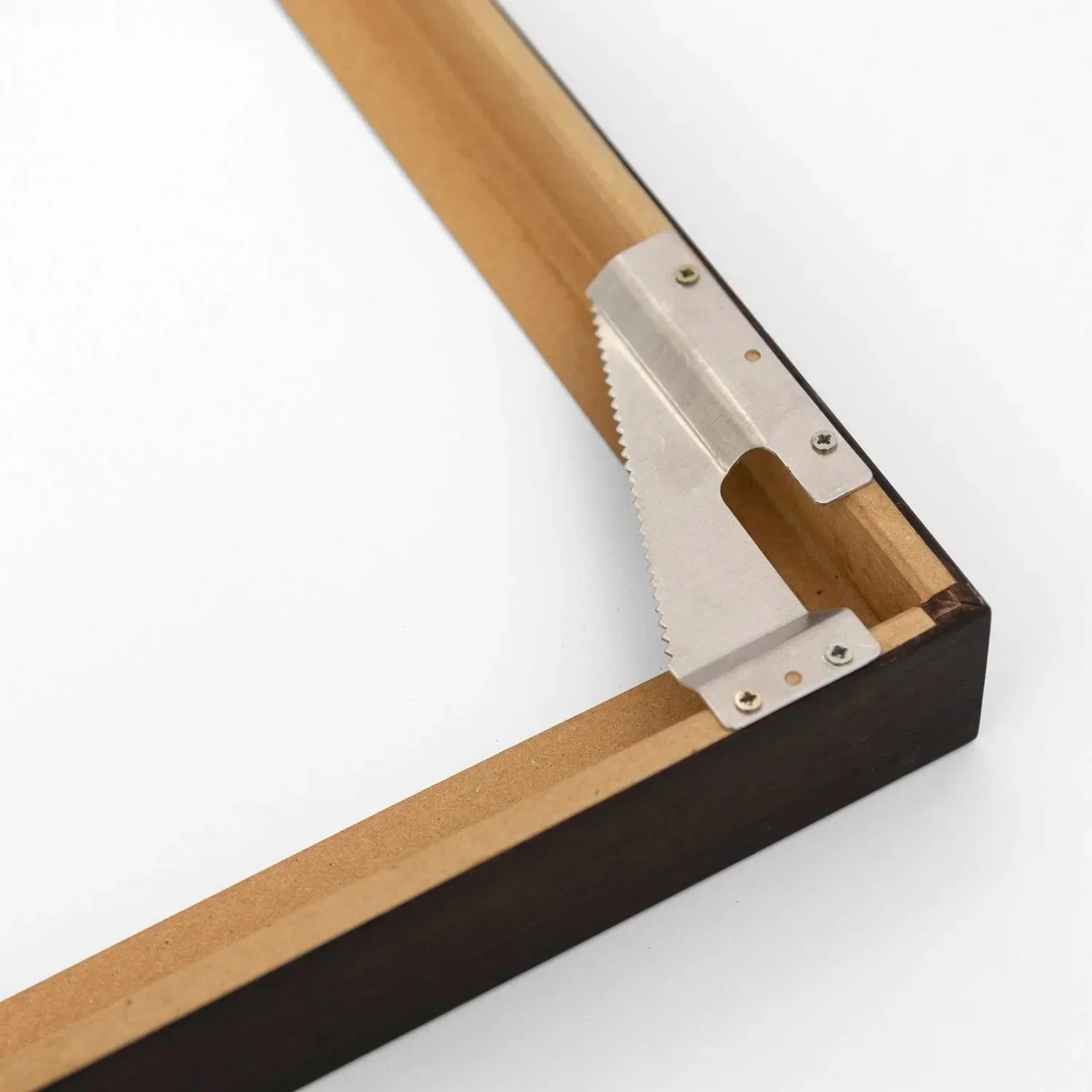 Metal wall-mounting fitting on the back of the dark-brown wooden frame of Golden Gate Study 14 by Gerald Berghammer.