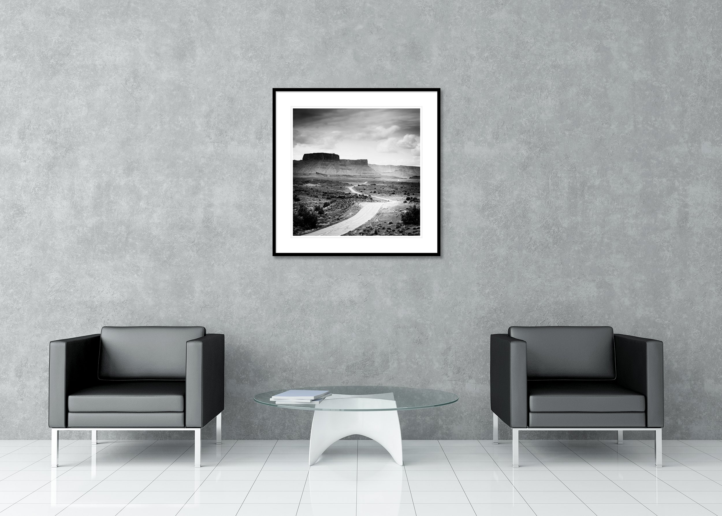 Road to Nowhere – Utah, USA, archival pigment print in a black aluminium frame with a white mount displayed in a modern interior. Photo by Gerald Berghammer.