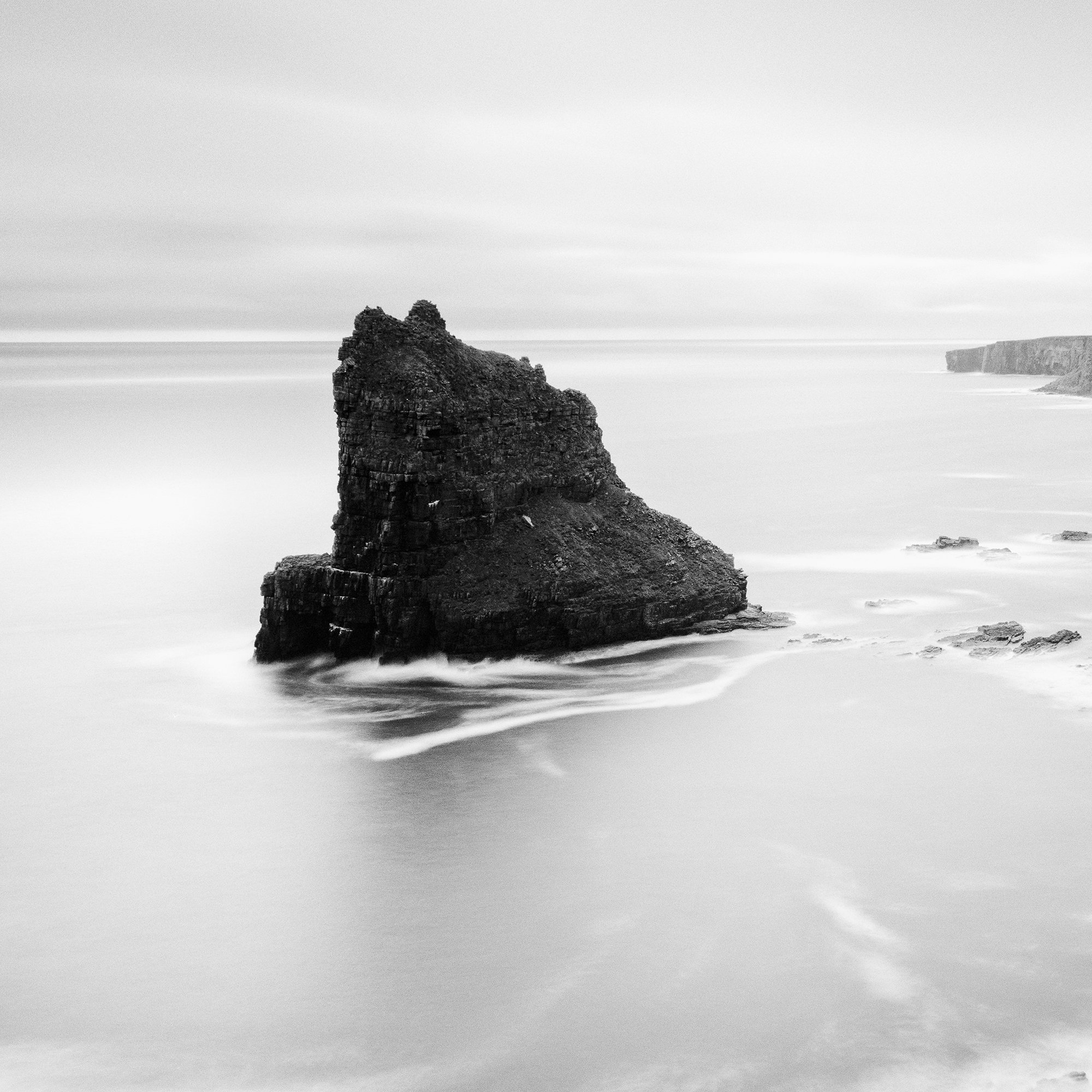 Detail of Surreal Moment Study 1 showing the long-exposure sea and rugged Scottish coastline by Gerald Berghammer.