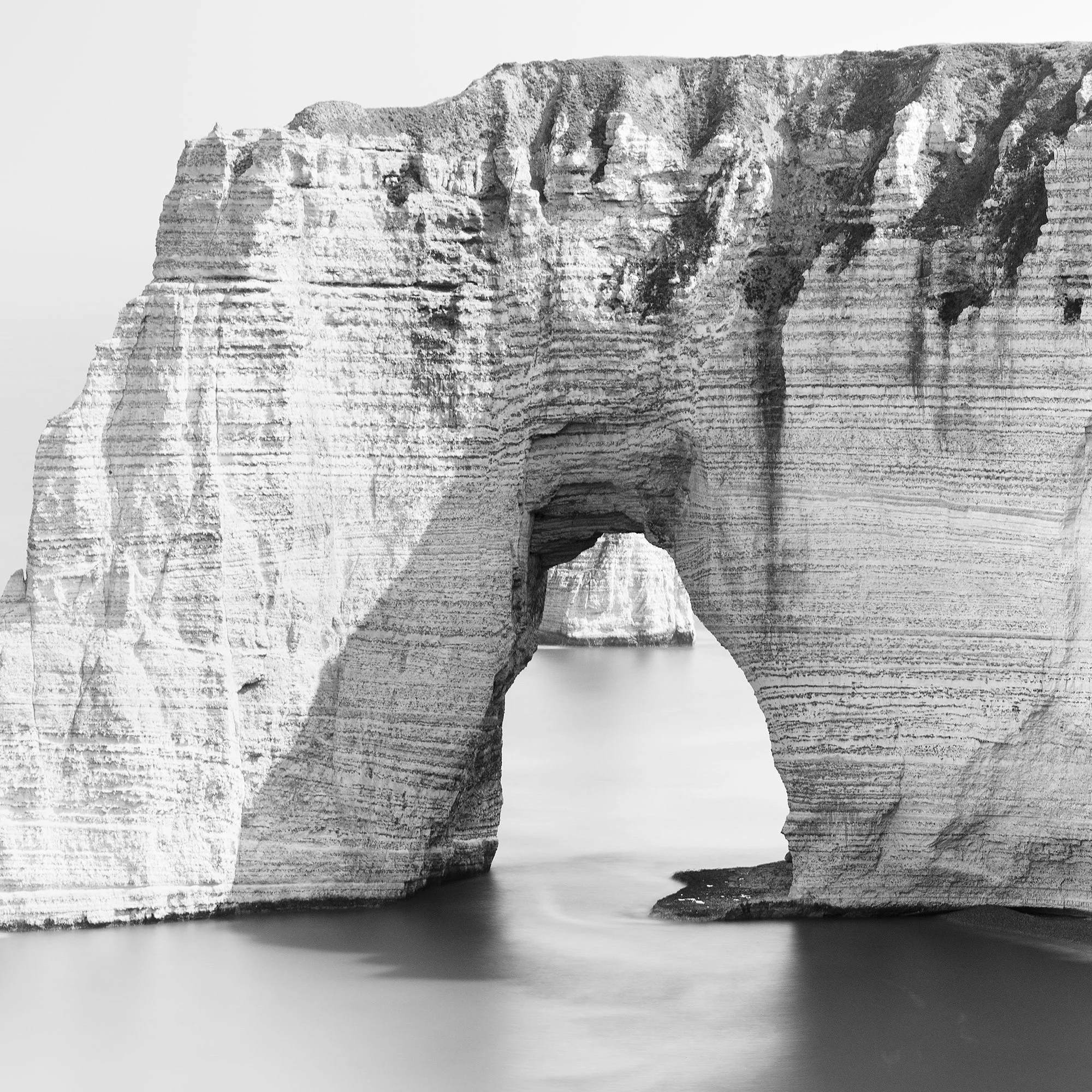Close-up of the natural chalk sea arch at Étretat, Normandy, from Alabaster Coast Study 1 by Gerald Berghammer.