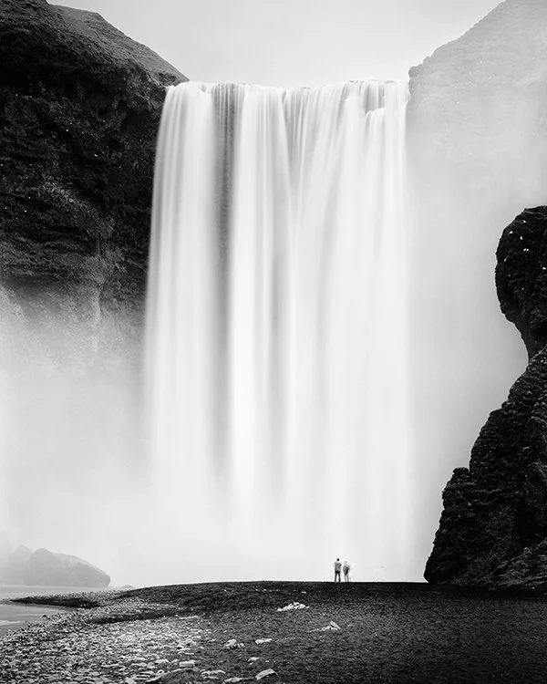 Skógafoss waterfall in Iceland by Gerald Berghammer, minimalist black-and-white long-exposure photograph exhibited at Galerie Arnoux in Paris in 2017.