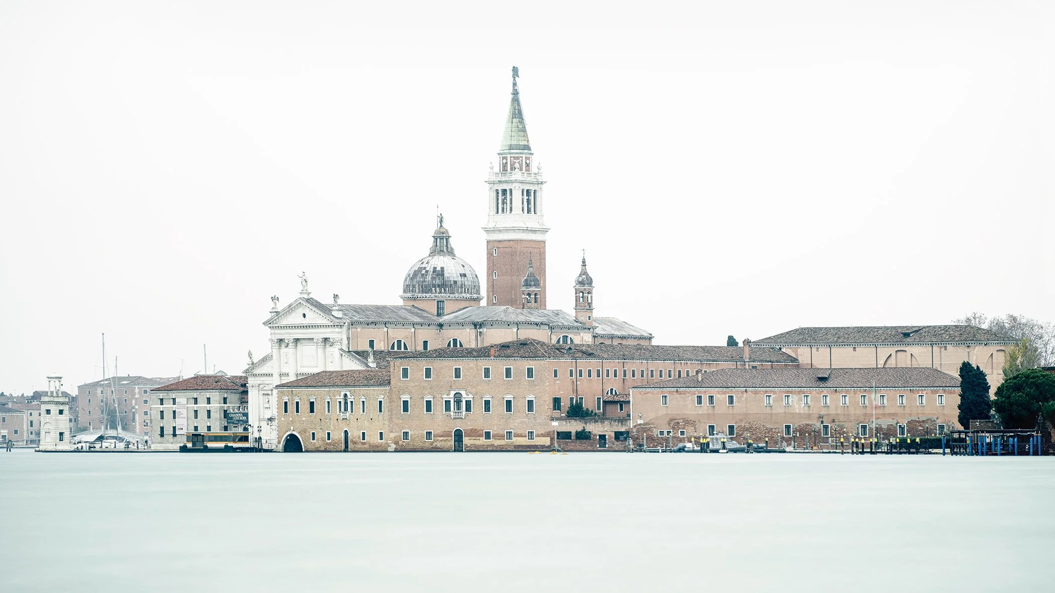 Basilica of San Giorgio Maggiore rising above the softly blurred lagoon waters of Venice, Italy. Photo by Gerald Berghammer.