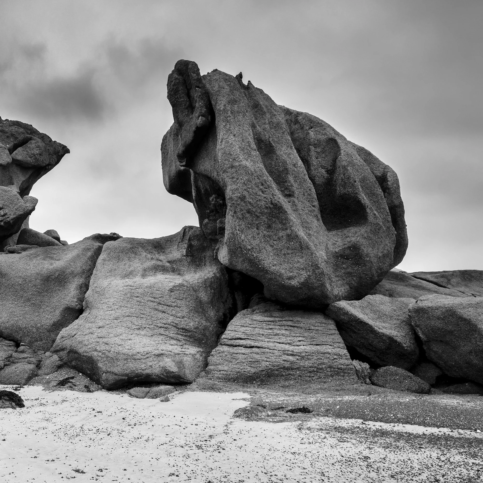 Cropped view of Crab Claws Rock Study 1 by Gerald Berghammer, black-and-white granite coast photograph from Brittany, France.