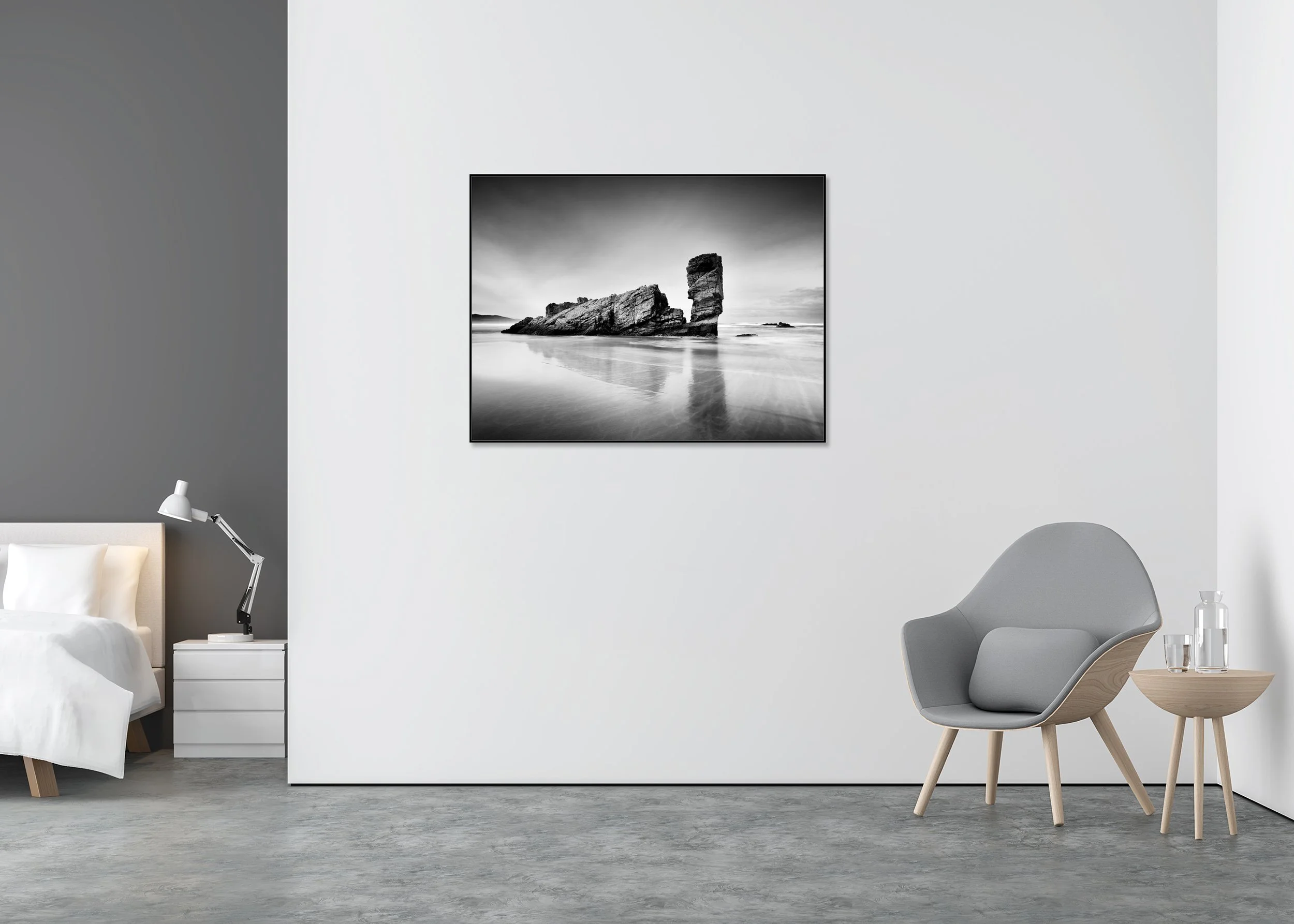 Monochrome long-exposure seascape print of a tall sea stack on a quiet beach, mounted to Dibond in a slim aluminium ArtBox frame