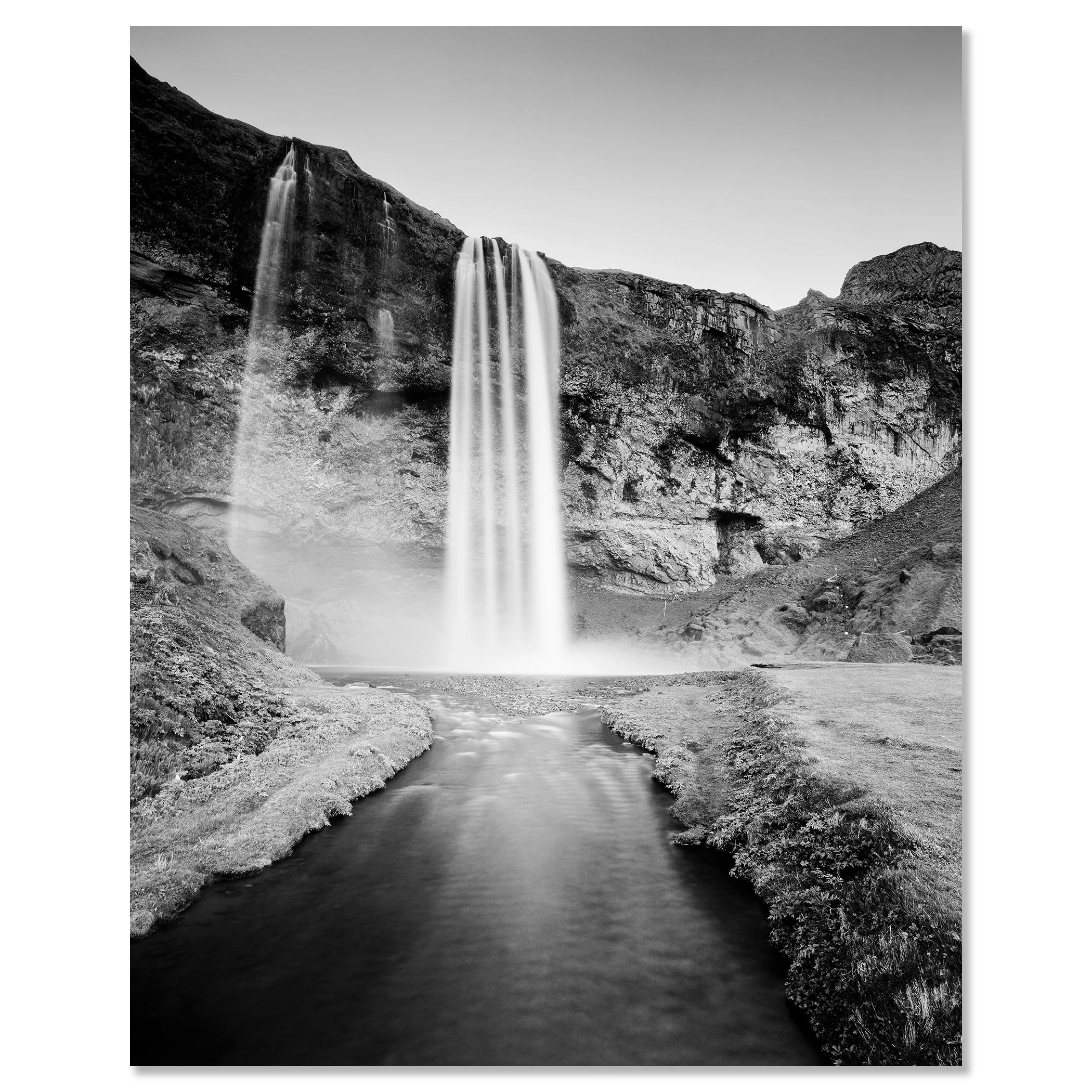 Seljalandsfoss Study 1 displayed as a black-and-white Dibond print in a black aluminium ArtBox by Gerald Berghammer.