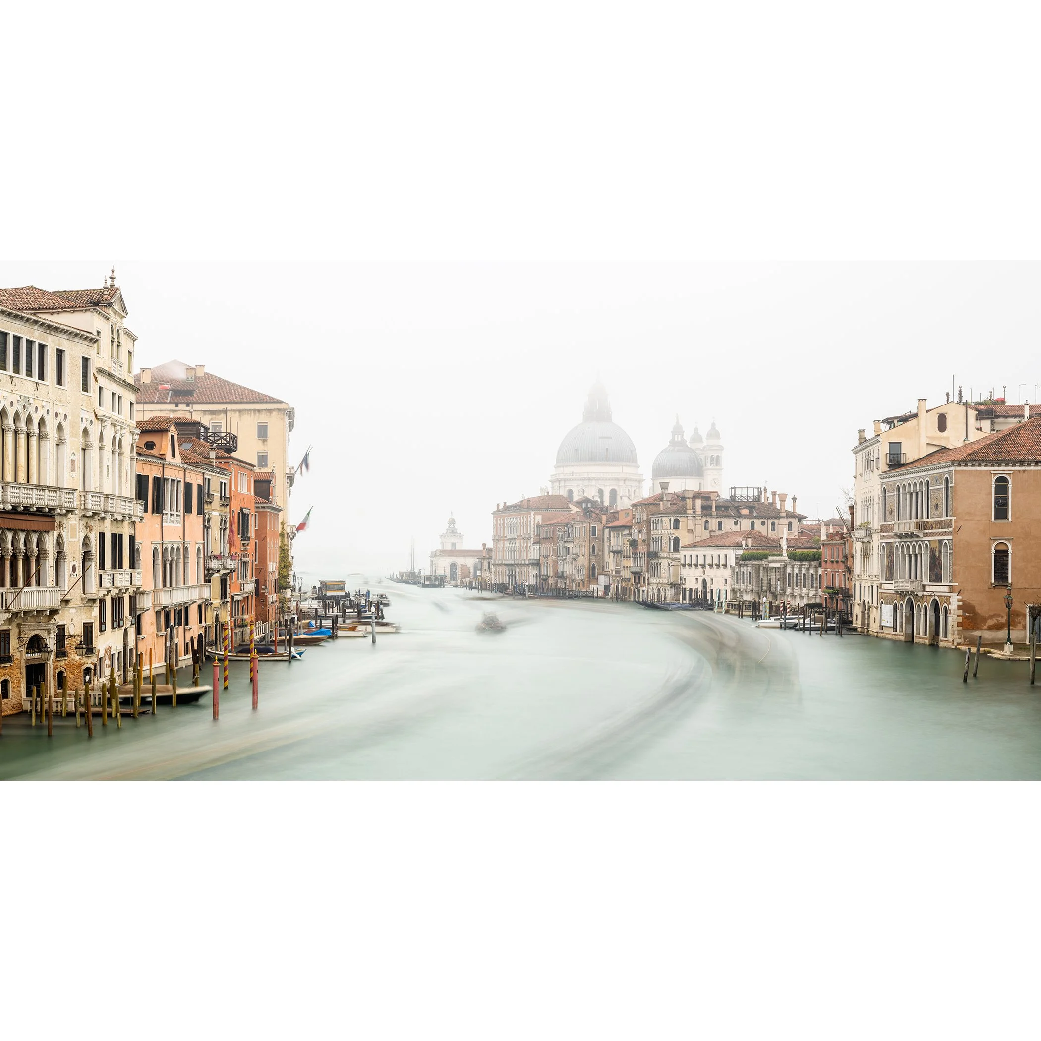 © 2025 Gerald Berghammer - Color cityscape photo. Foggy grand canal with historic buildings on both sides and the domed Basilica di Santa Maria della Salute.