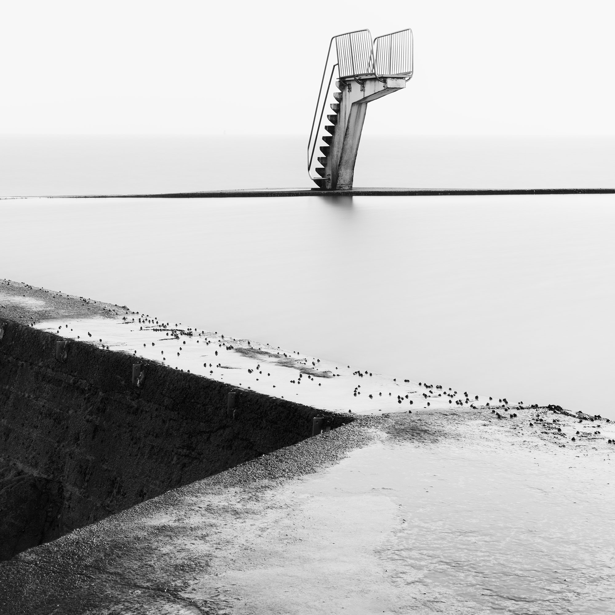 Detail of Diving Platform Study 3 by Gerald Berghammer showing the minimalist structure and smooth water.