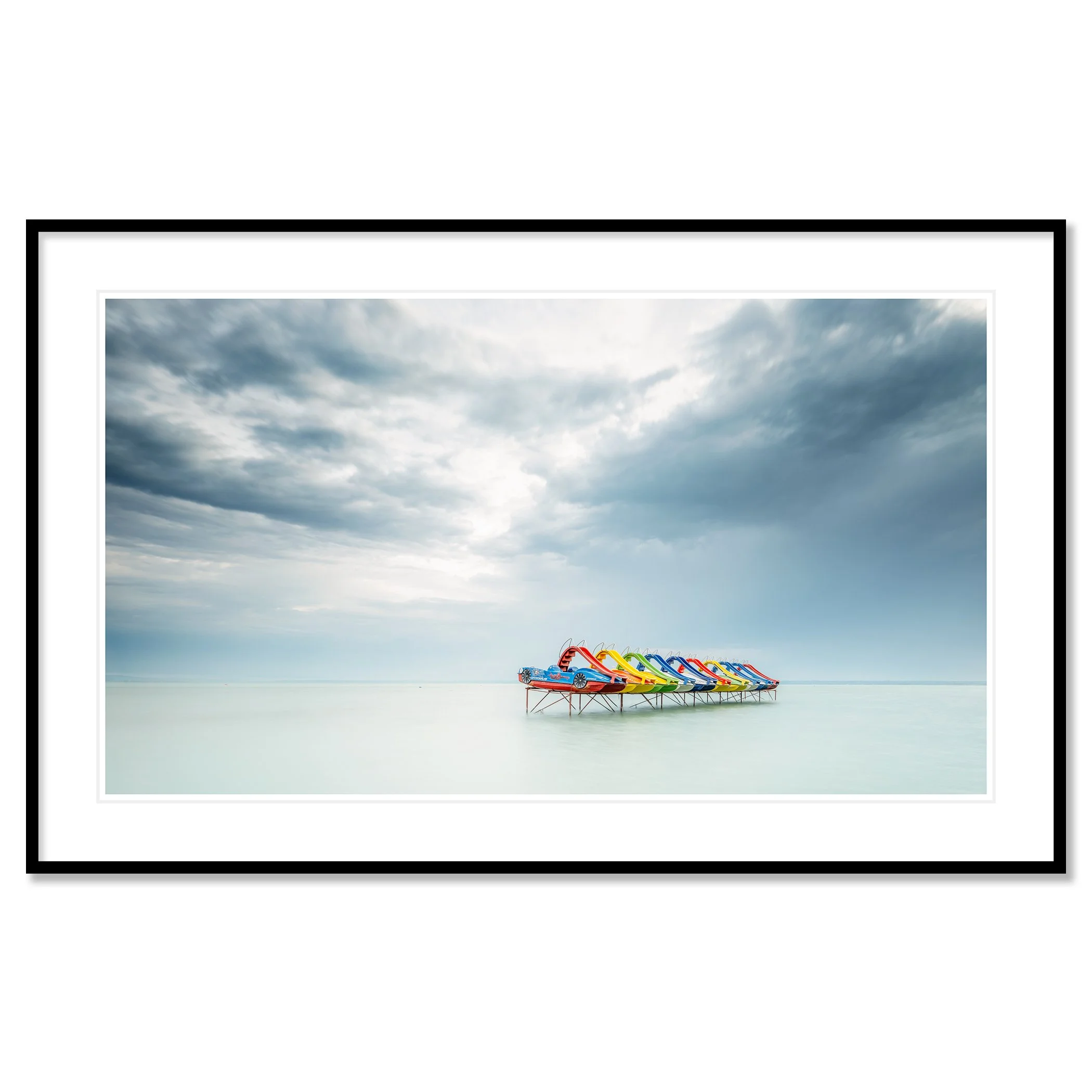 © 2021 Gerald Berghammer - Color panorama waterscape photography. A row of colorful pedal boats on the lake Balaton with dramatic cloudy sky. Classic framed black