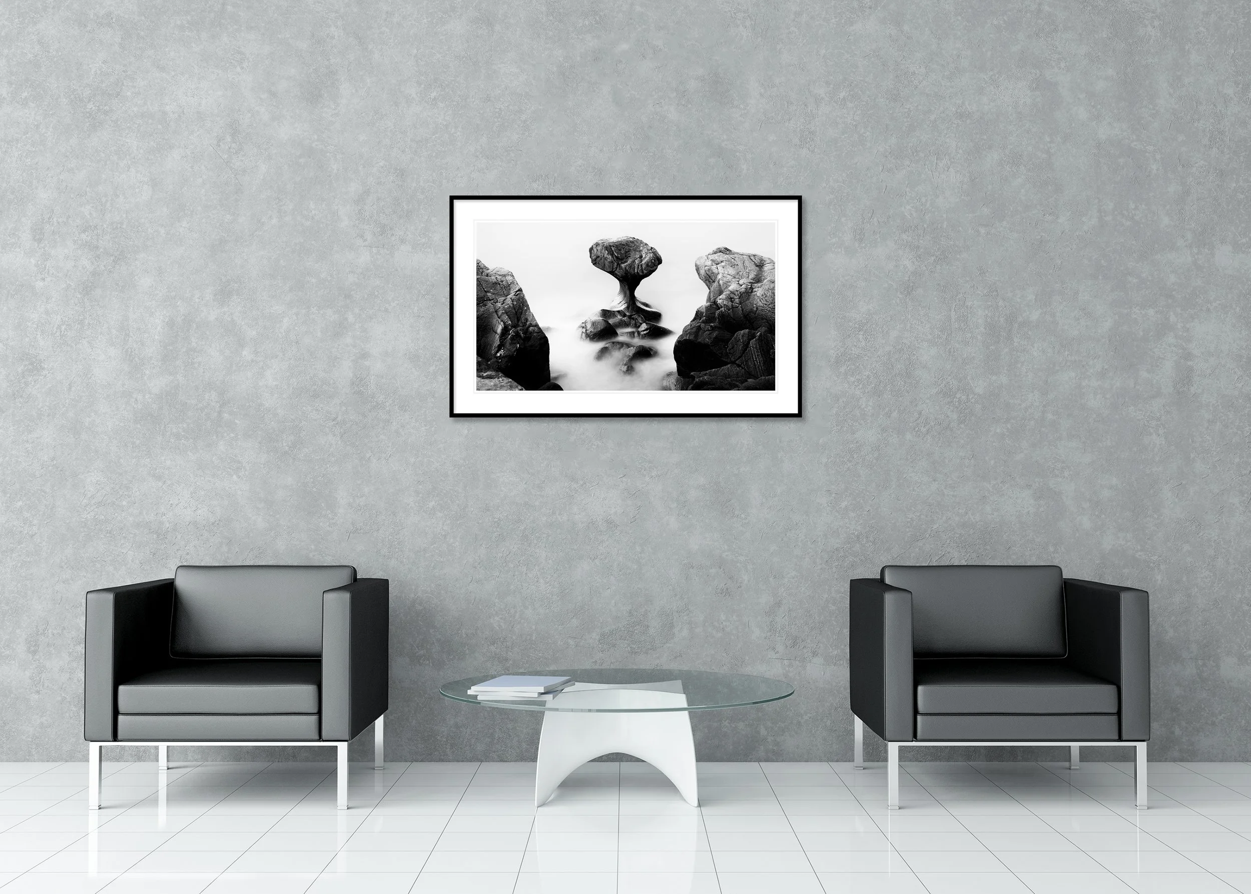 Mushroom-shaped rock formation on calm water, shown as an archival pigment print in a classic frame with passe-partout.