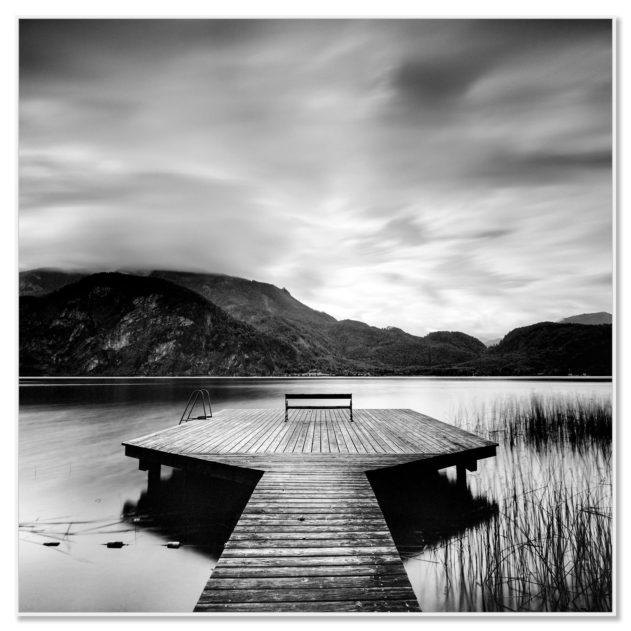 Wood Pier Study 2 – Austria, black-and-white photograph in a white aluminium ArtBox frame