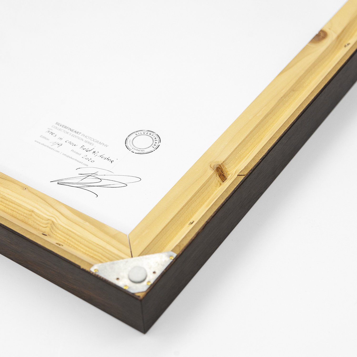 Rear corner of Gerald Berghammer's framed photograph, showing the artist's signature, edition label and SILVERFINEART stamp.