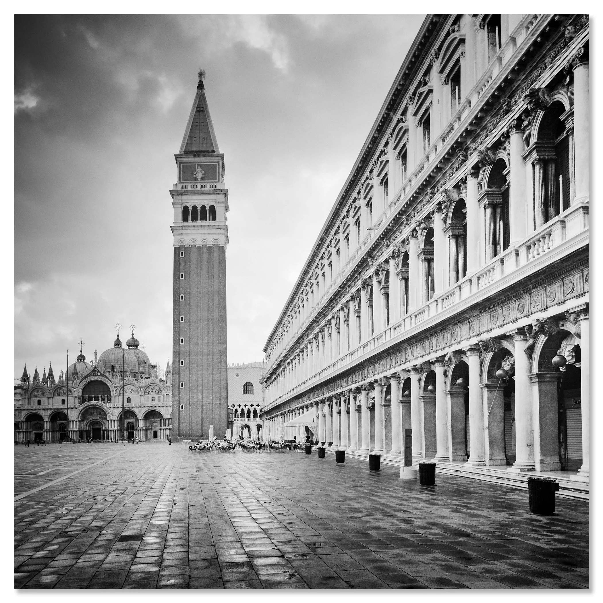 Gerald Berghammer - B&W Cityscape Photography. St. Mark's Square in Venice, showing the Campanile bell tower, St. Mark's Basilica and historic buildings. Chromaluxe frameless