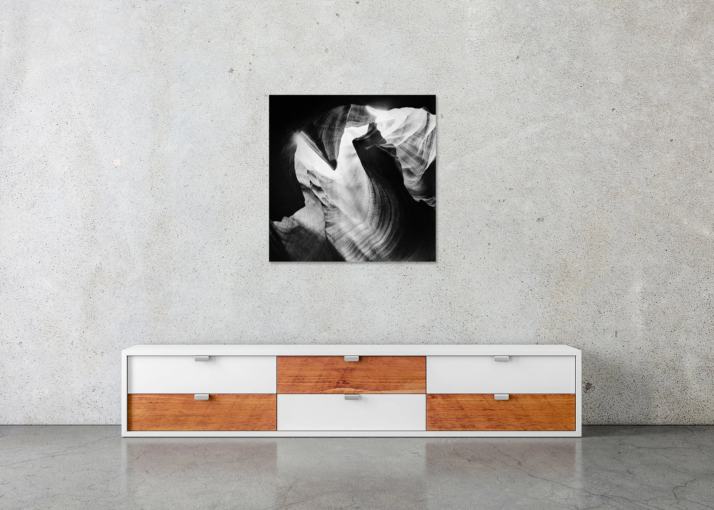 Antelope Canyon Study 4 displayed in a modern interior as a frameless black-and-white artwork mounted on aluminium Dibond by Gerald Berghammer.