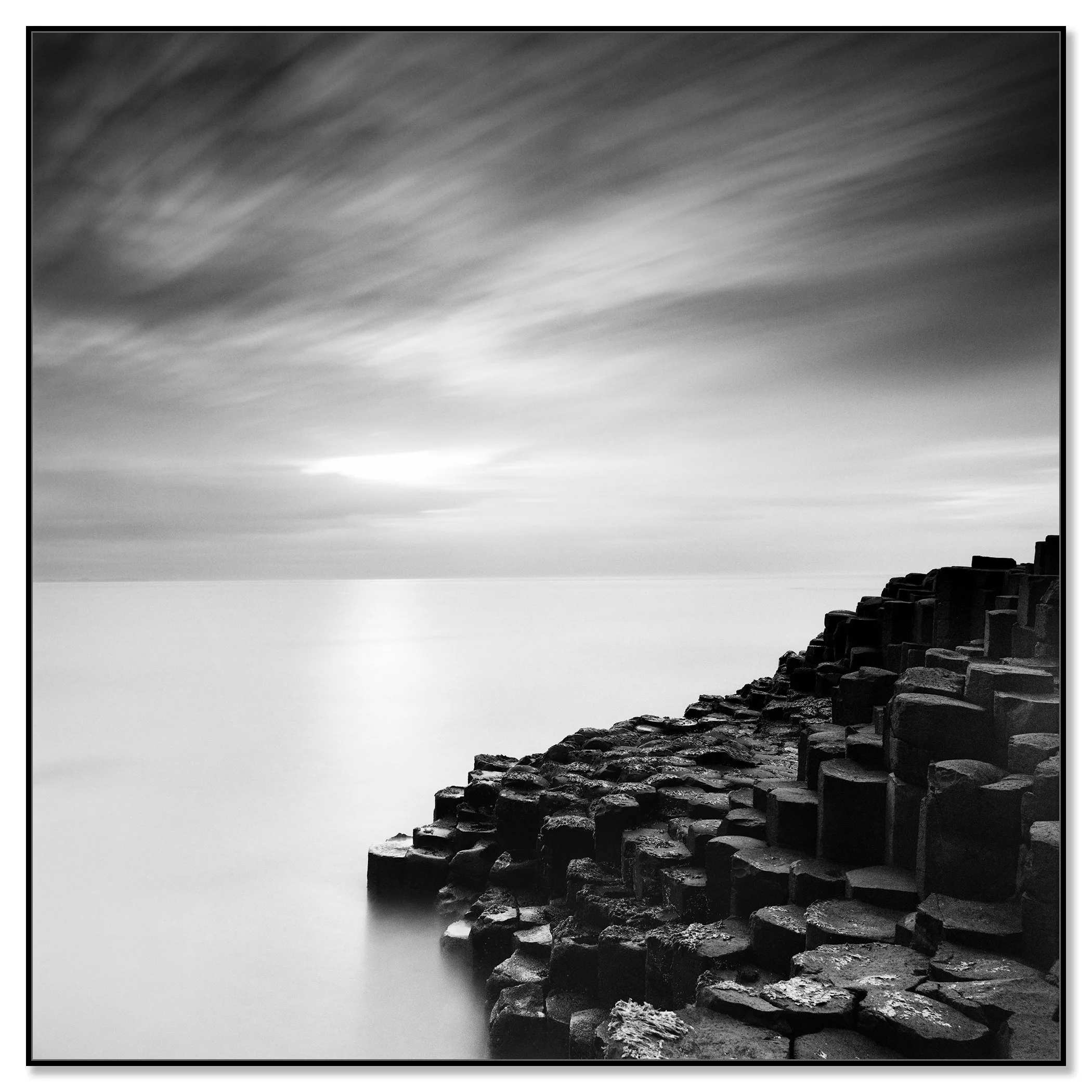 Giant’s Causeway Study 3 by Gerald Berghammer, black-and-white photograph on aluminium Dibond in a black ArtBox frame.