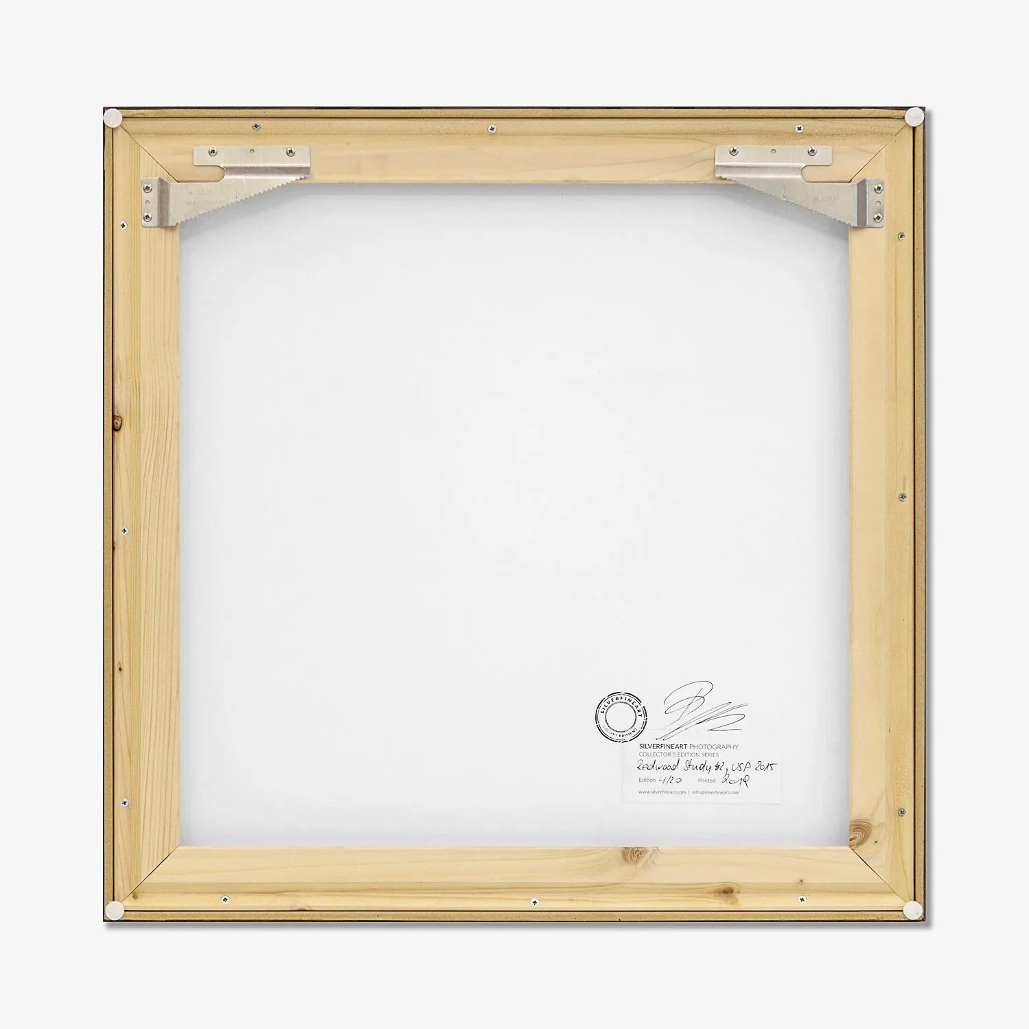 Reverse of Redwood Study 2 by Gerald Berghammer, showing the wooden frame, mounting hardware and signed edition label.