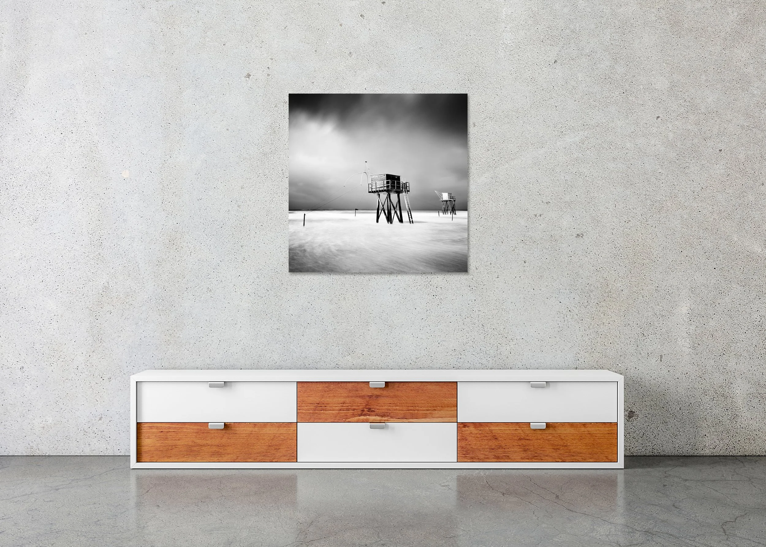 Frameless Chromaluxe black and white seascape photograph of stilt fishing huts over calm water by Gerald Berghammer.