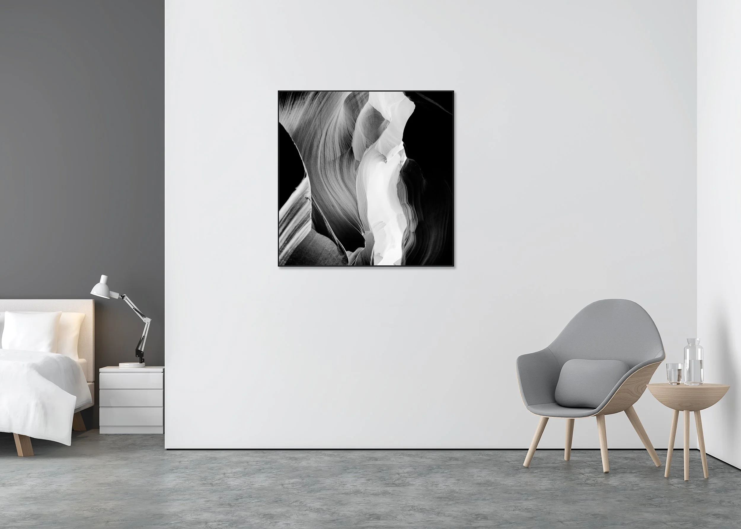 Black-and-white photo print of flowing sandstone slot canyon walls, layered textures and dramatic light, mounted to Dibond in an aluminium ArtBox frame.