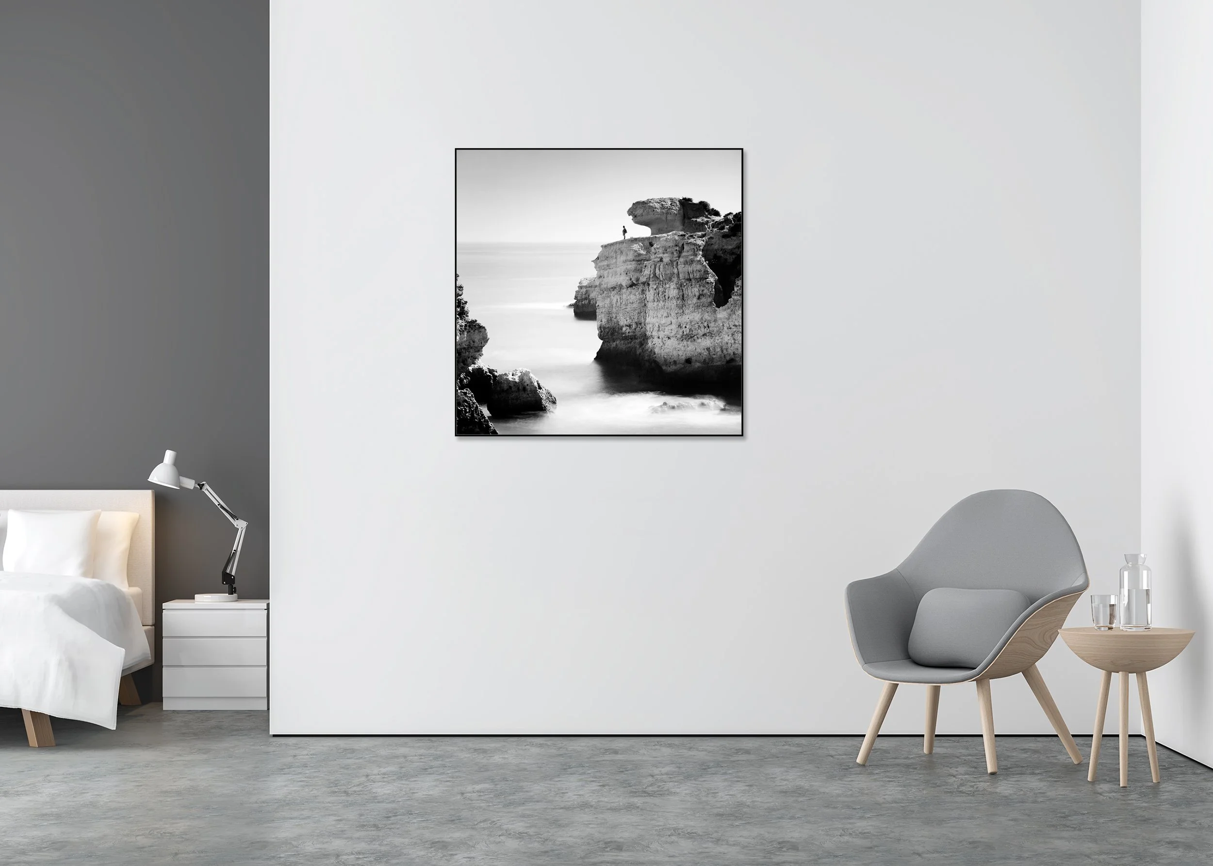 Rock Fishing Study 1 – black-and-white photograph in a black aluminium ArtBox displayed in a minimalist bedroom. Photo by Gerald Berghammer.