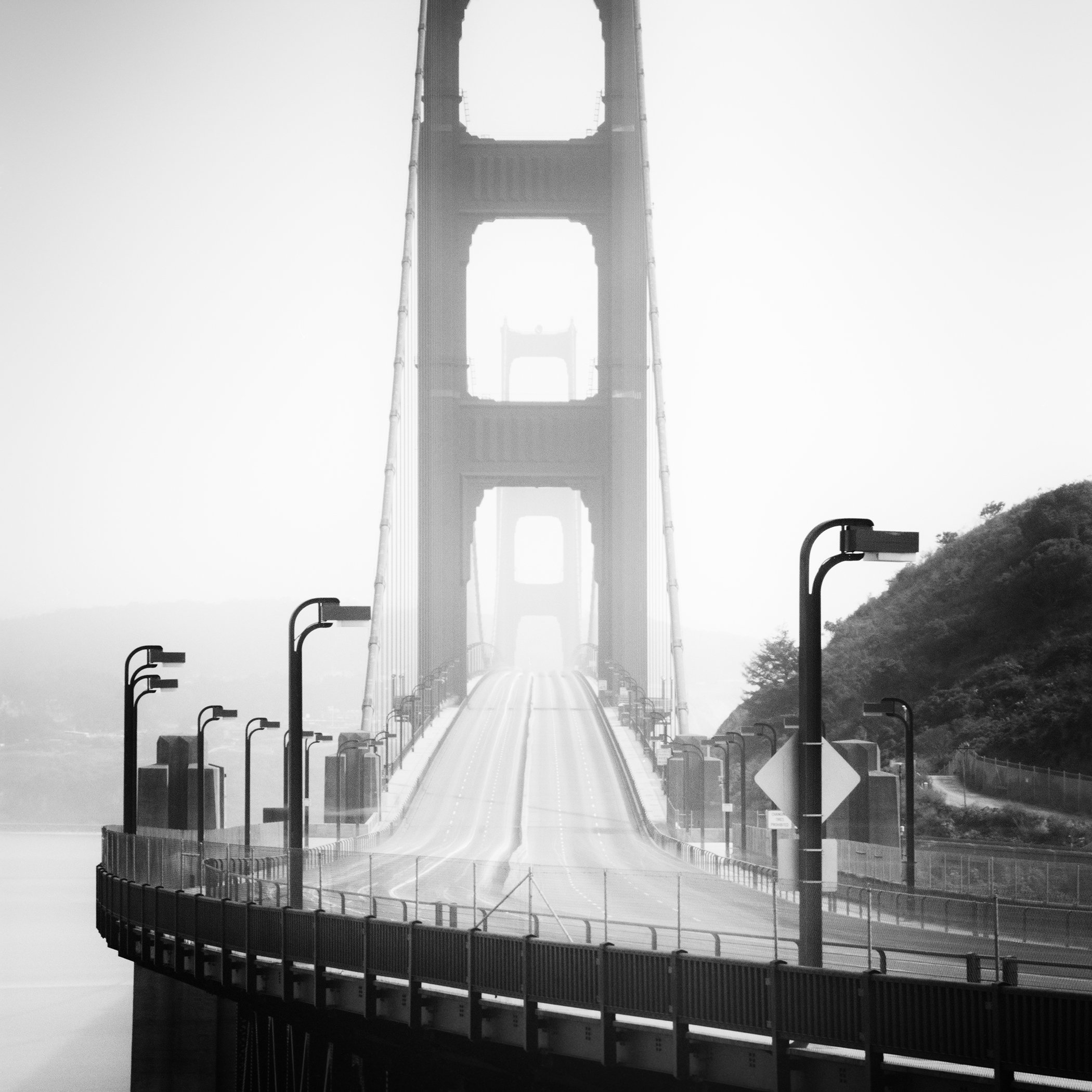 Golden Gate Bridge Study 7 by Gerald Berghammer, black-and-white fine art photograph of the bridge disappearing into fog in San Francisco, California.