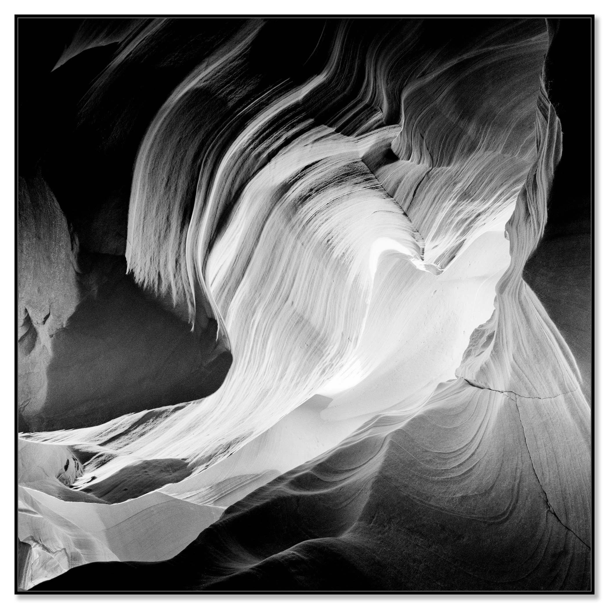 Heart by Gerald Berghammer, black-and-white Antelope Canyon photograph on aluminium Dibond in a black aluminium ArtBox frame.
