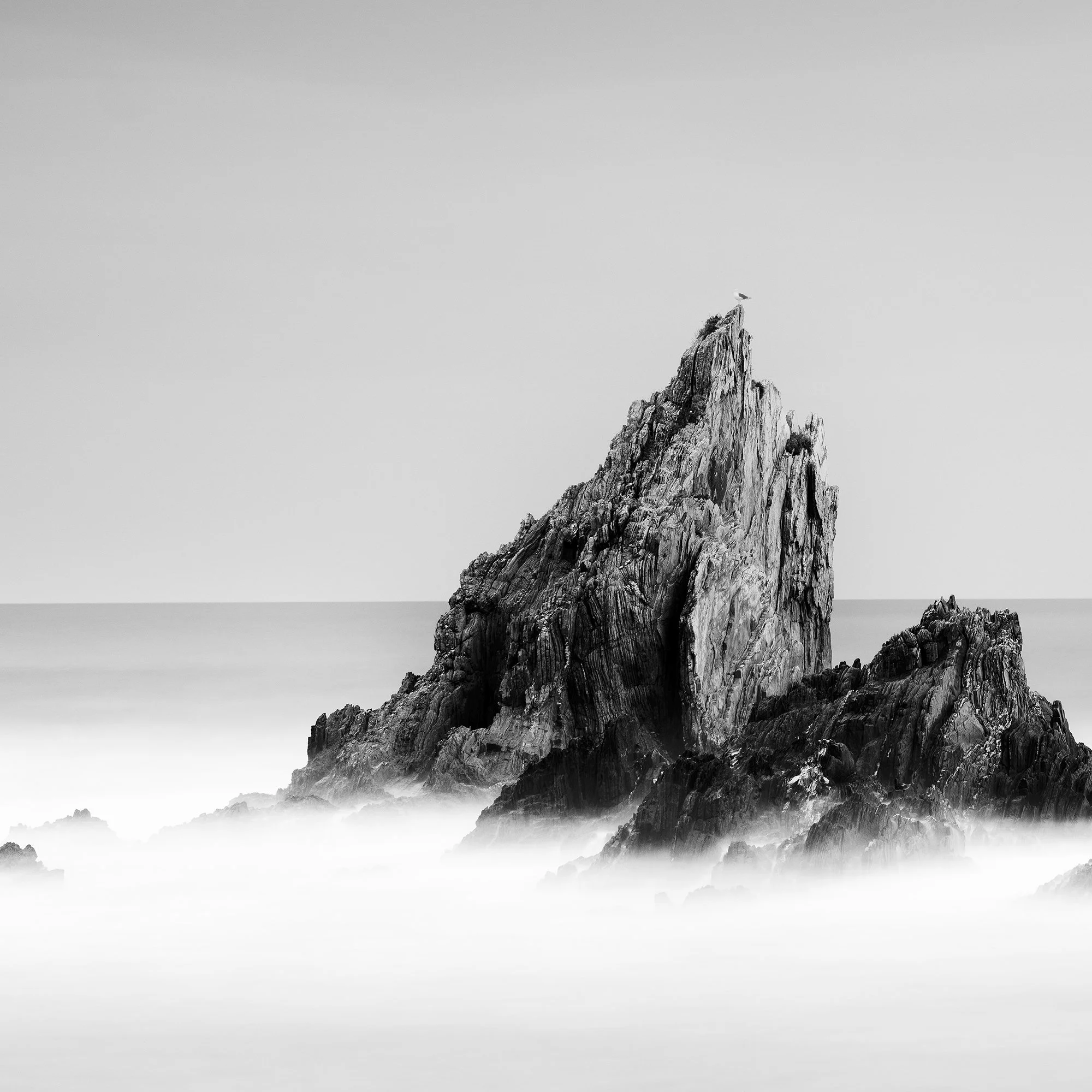 Rocky Peaks, Panorama Study 3 – detail view of jagged Atlantic sea stacks and mist-like water in Spain by Gerald Berghammer.