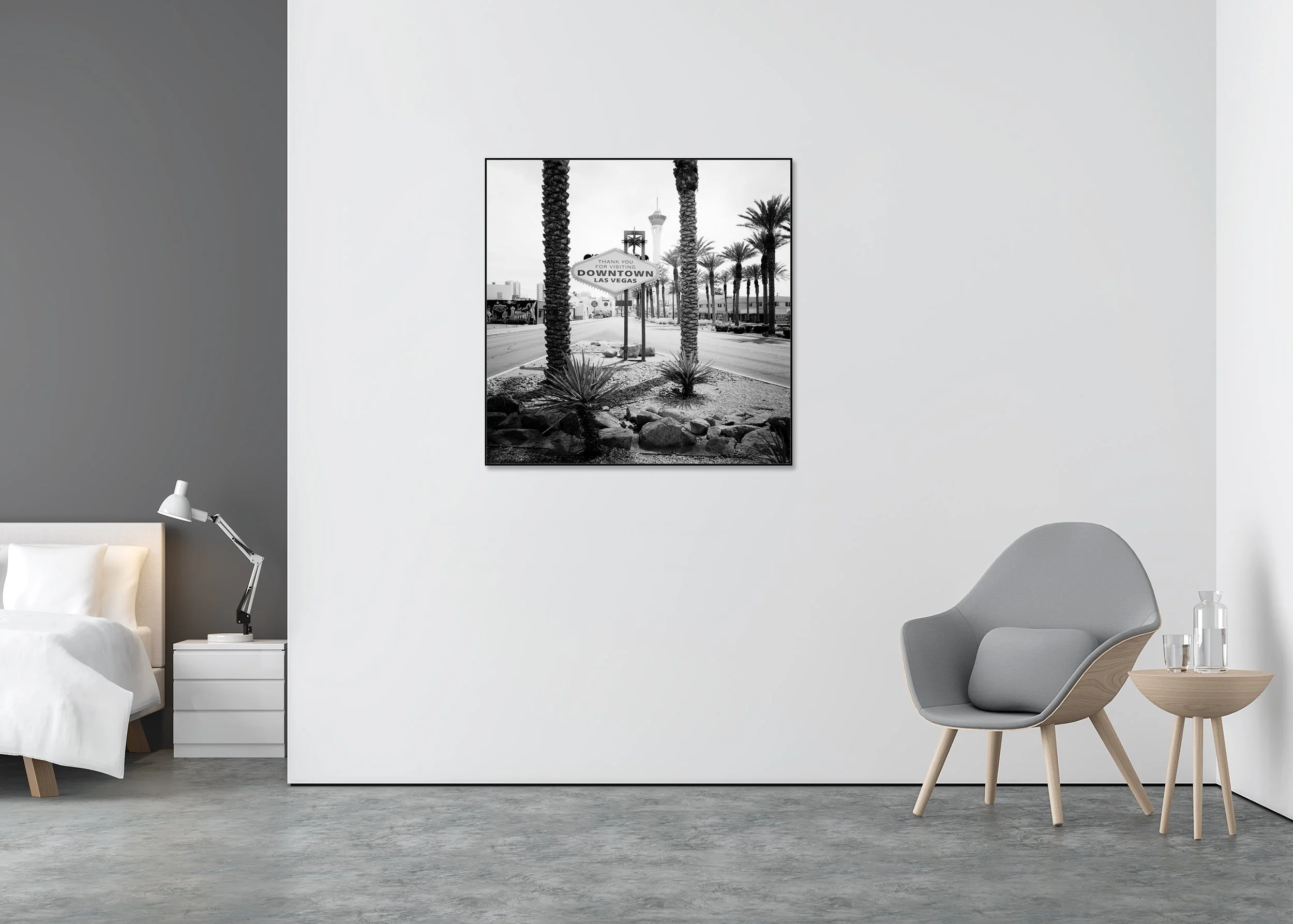 Downtown Las Vegas – black-and-white fine art photograph in a black aluminium ArtBox displayed in a contemporary bedroom.