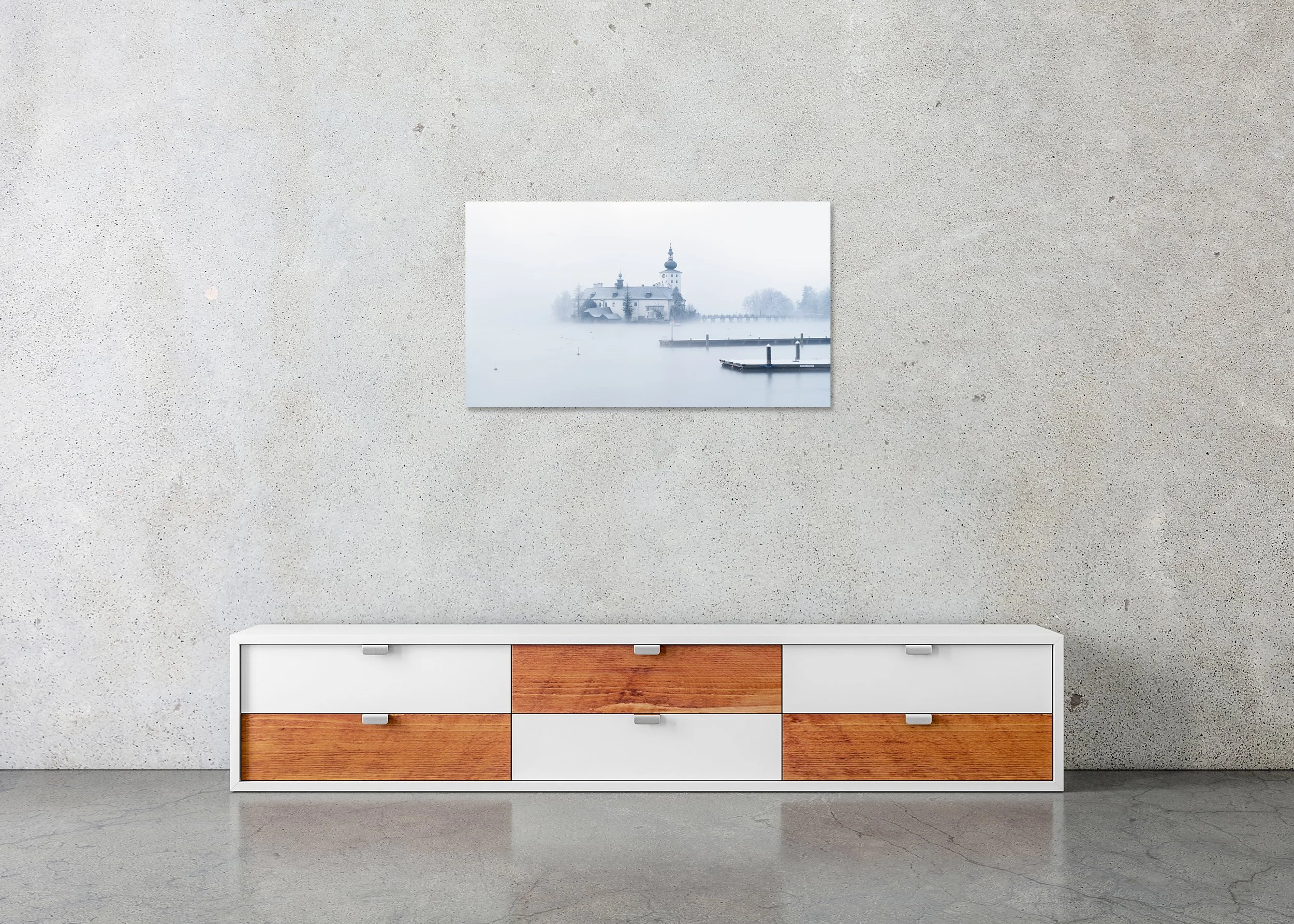 Seeschloss Ort in Winter, Study 1 – frameless panoramic colour photograph on aluminium Dibond displayed in a minimalist interior. Photo by Gerald Berghammer.