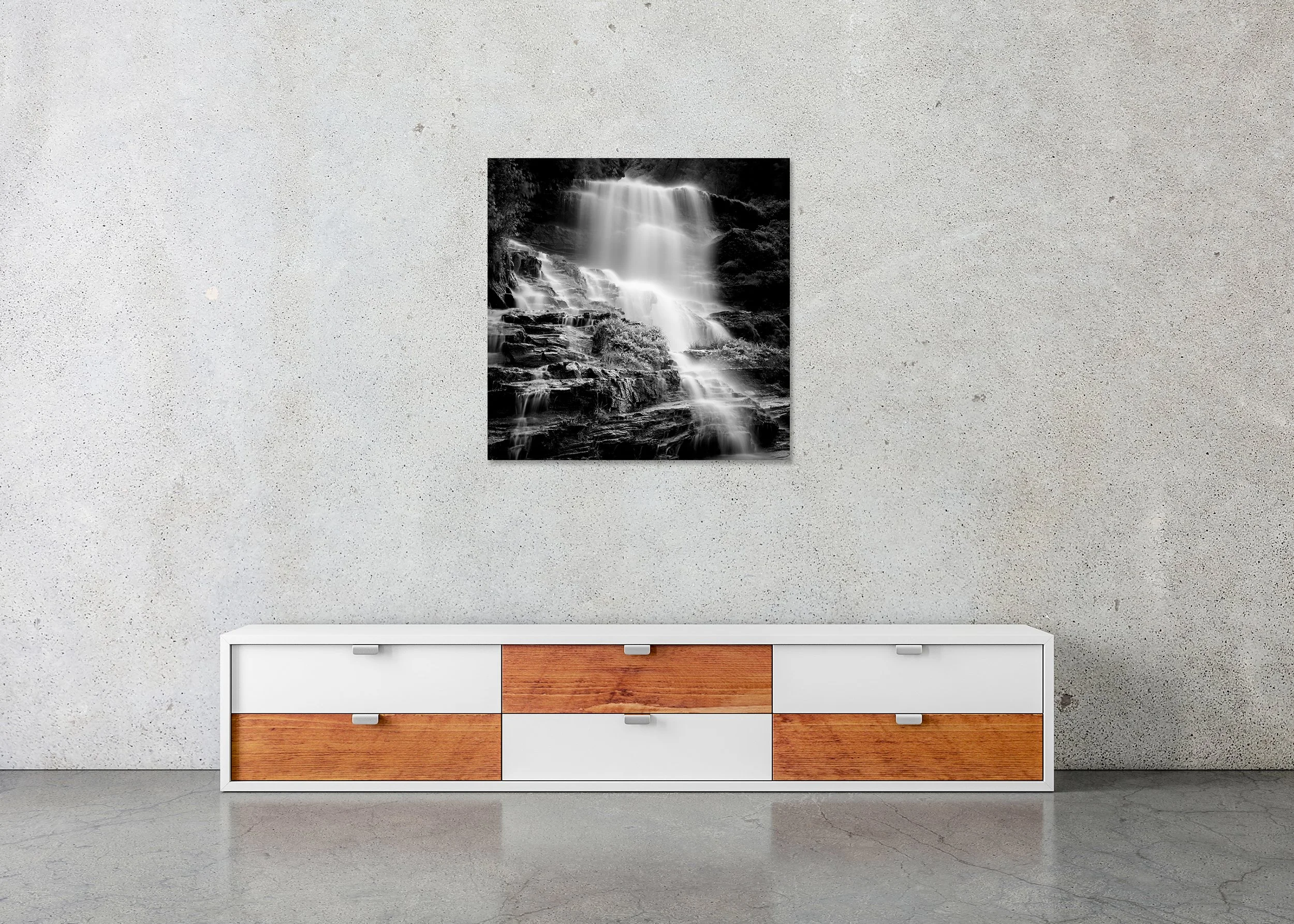 Klockelefall Waterfall Study 2 displayed in a modern interior as a frameless black-and-white artwork mounted on aluminium Dibond by Gerald Berghammer.