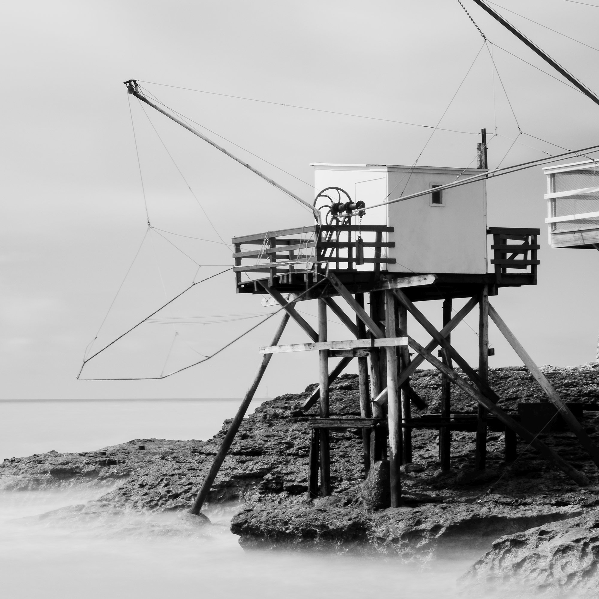 Close-up of a traditional carrelet fishing hut in France in Carrelet Study 1 by Gerald Berghammer.